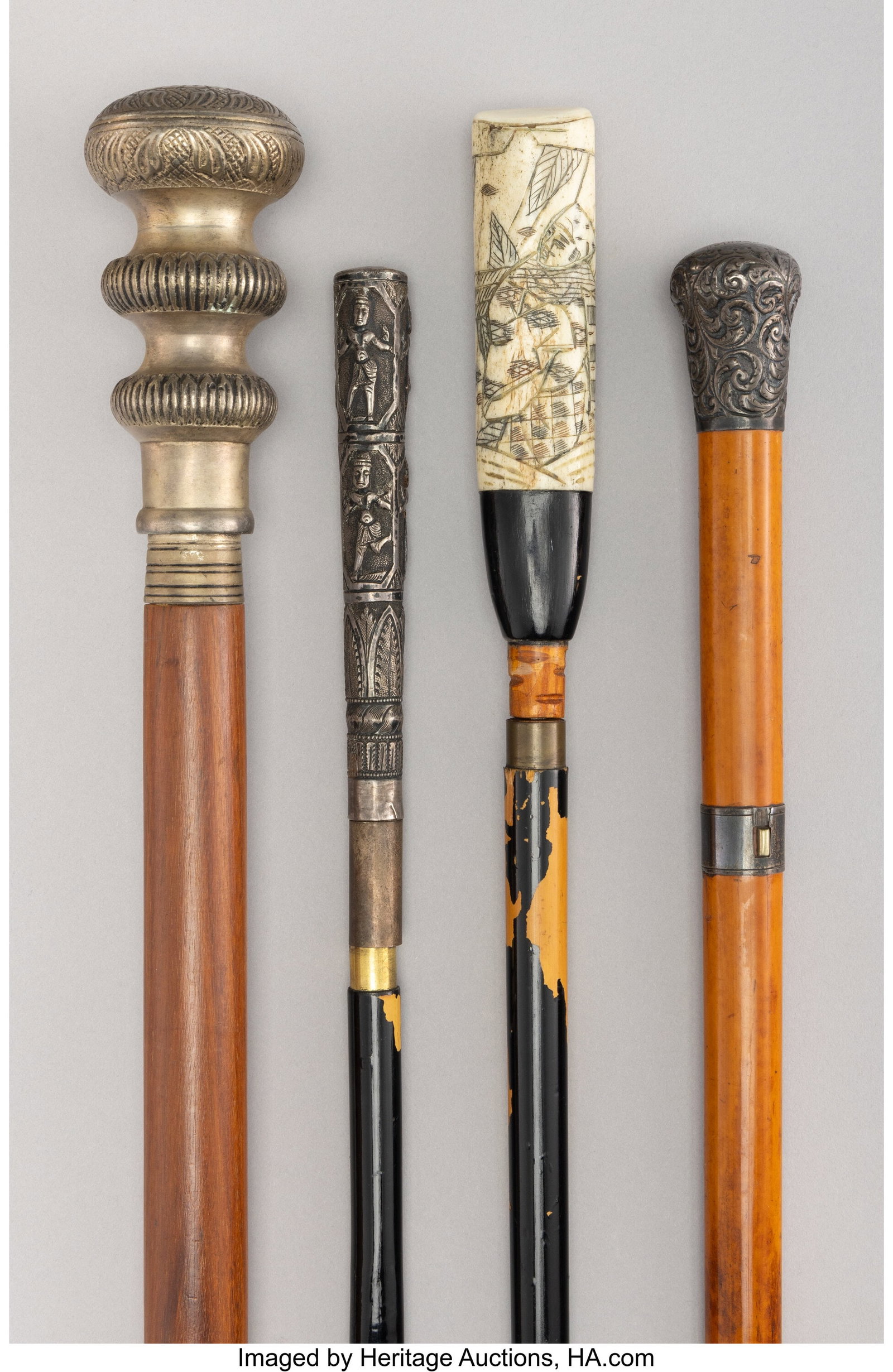 Four Silver, Metal-Mounted, Wood, and Bamboo Wal: Four Silver, Metal-Mounted, Wood, and Bamboo Walking Sticks, circa 1890 Marks to one: (lion passant), (anchor), F.M., 