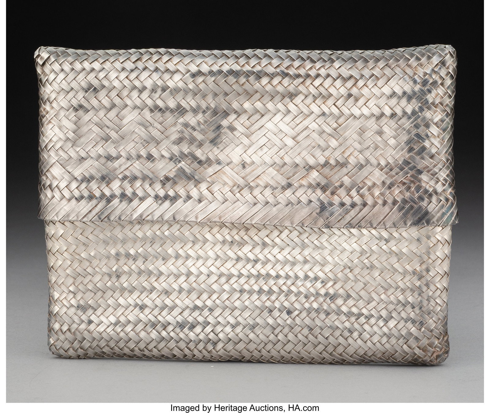An Elsa Peretti Woven Silver Clutch for Tiffany : An Elsa Peretti Woven Silver Clutch for Tiffany & Co., New York, late 20th century Marks: STERLING, TIFFANY & Co., Peretti 4-1/4 x 6-1/8 x 0