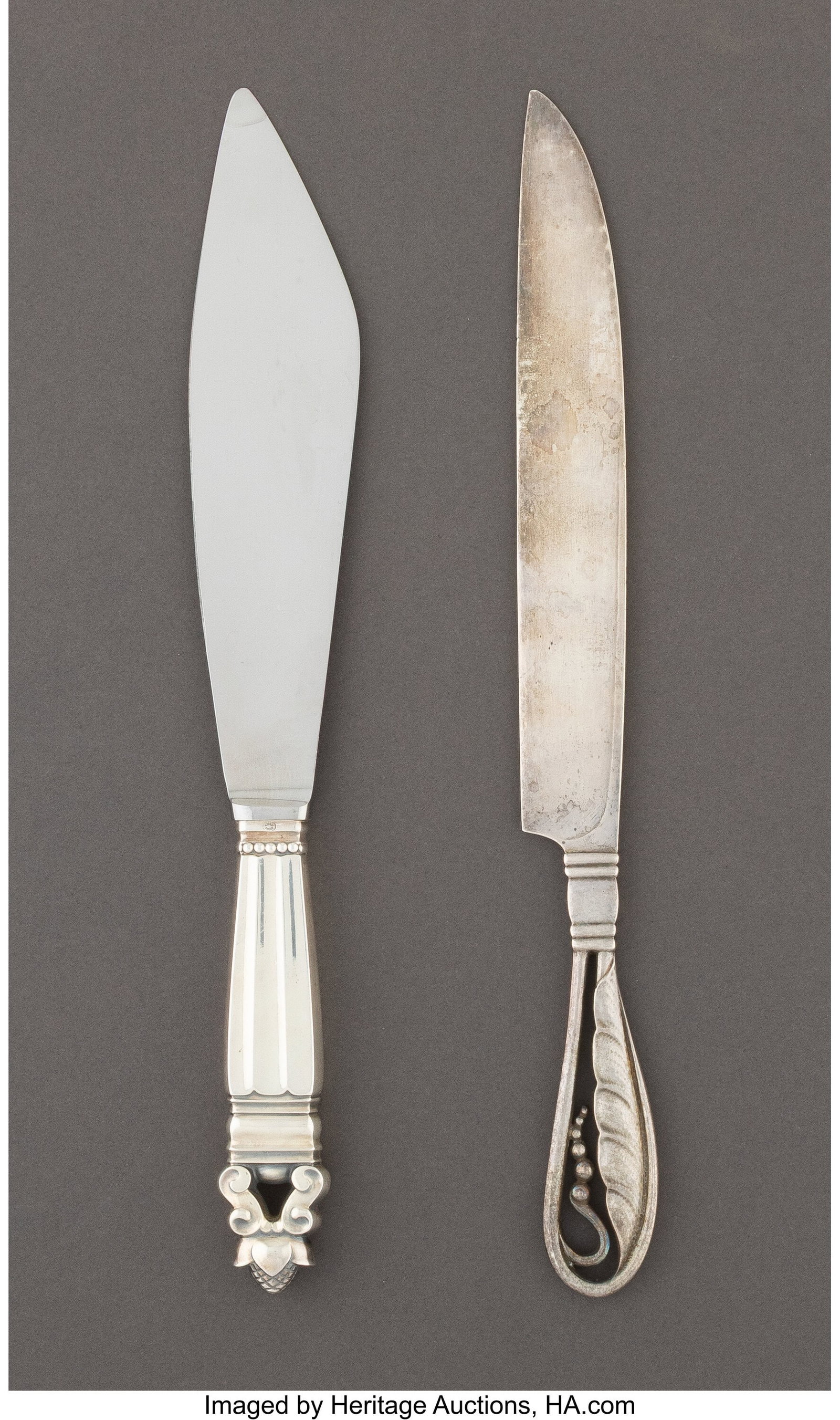 Two Georg Jensen Silver Cake Knives, Copenhagen,: Two Georg Jensen Silver Cake Knives, Copenhagen, Denmark, early 20th century Marks to one: (dotted oval-GEORG JENSEN), STERLING, DENMARK 10-1/2 inches