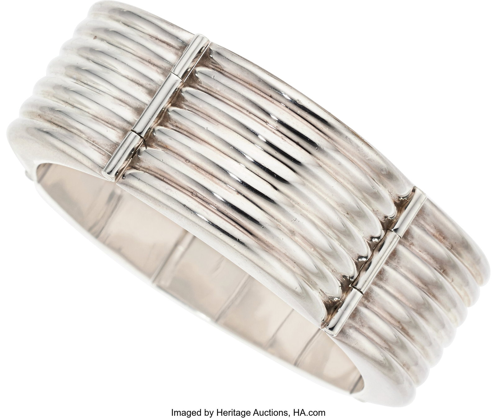 Tiffany & Co. Sterling Silver Bracelet Metal: S: Tiffany & Co. Sterling Silver Bracelet Metal: Sterling silver Marked: Tiffany & Co. Weight: 70.50 grams Dimensions: 7 inches x 7/8 inch Estate 