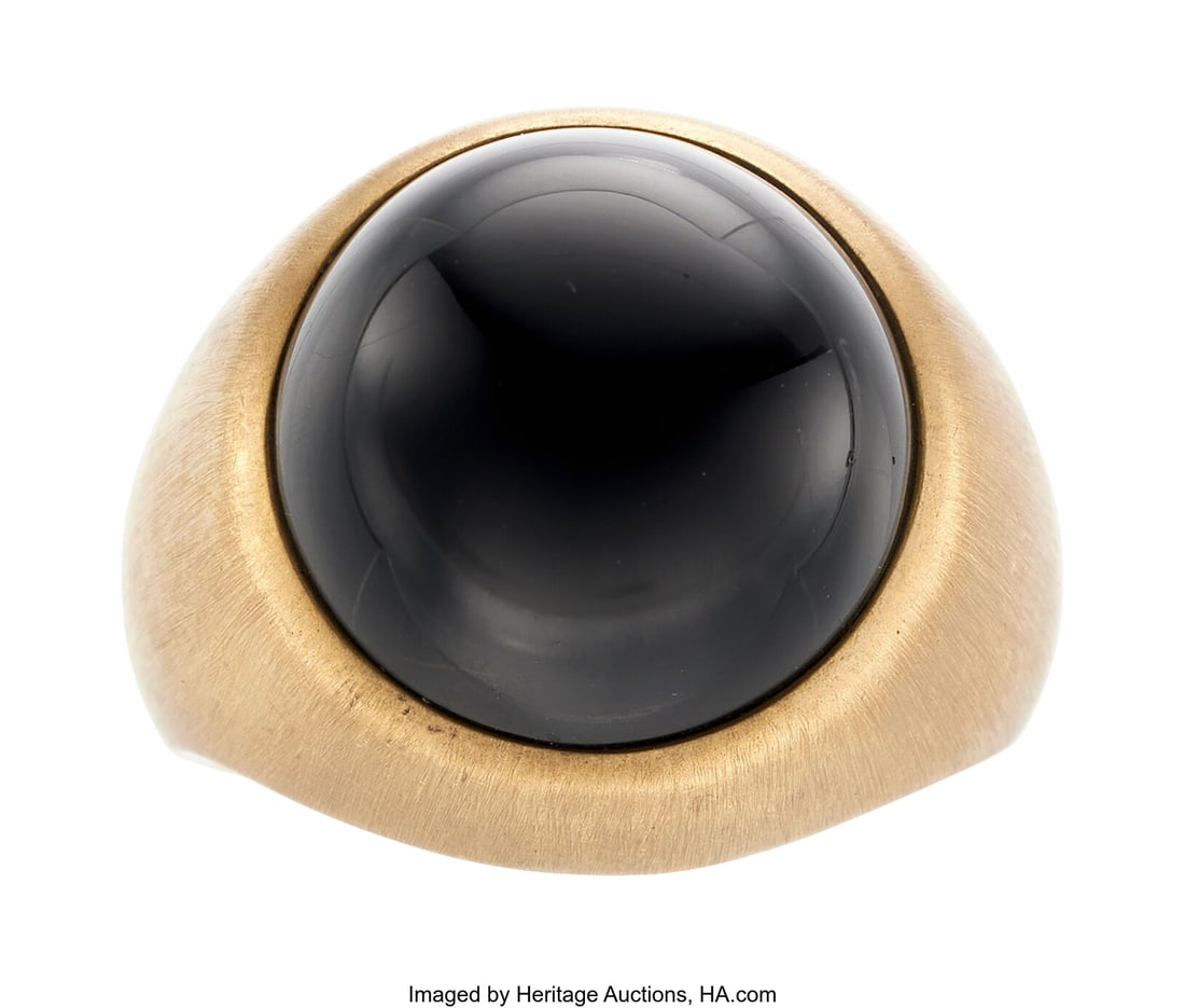 Black Onyx, Gold Ring Stones: Black onyx caboch: Black Onyx, Gold Ring Stones: Black onyx cabochon Metal: 14k gold ring Gross Weight: 25.50 grams Size: 9-1/2 (sizeable) Estate of Joyce Daily Goodman
