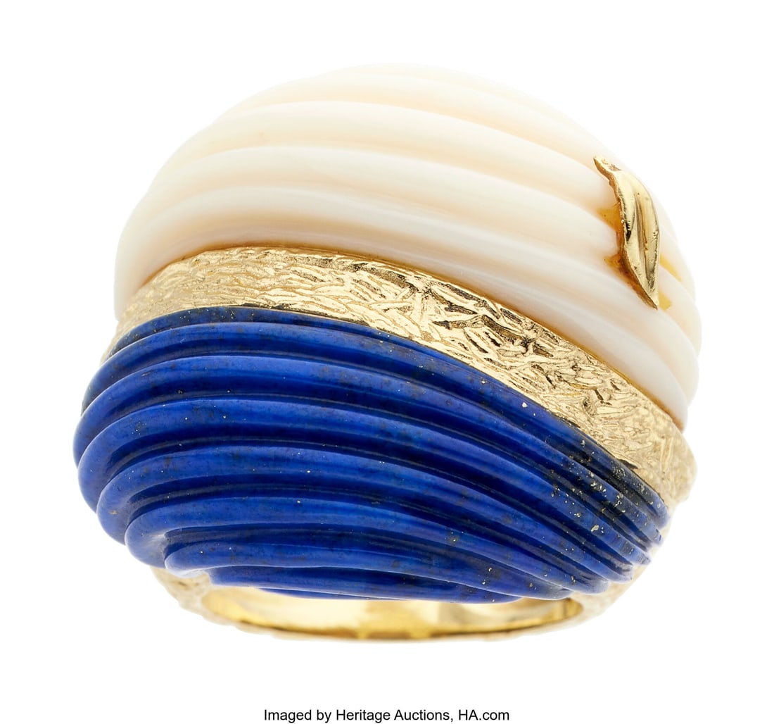 Lapis Lazuli, Coral, Gold Ring Stones: Carved l: Lapis Lazuli, Coral, Gold Ring Stones: Carved lapis lazuli and coral Metal: 18k gold Gross Weight: 25.30 grams Size: 6-1/4 (*sizeable) Esta