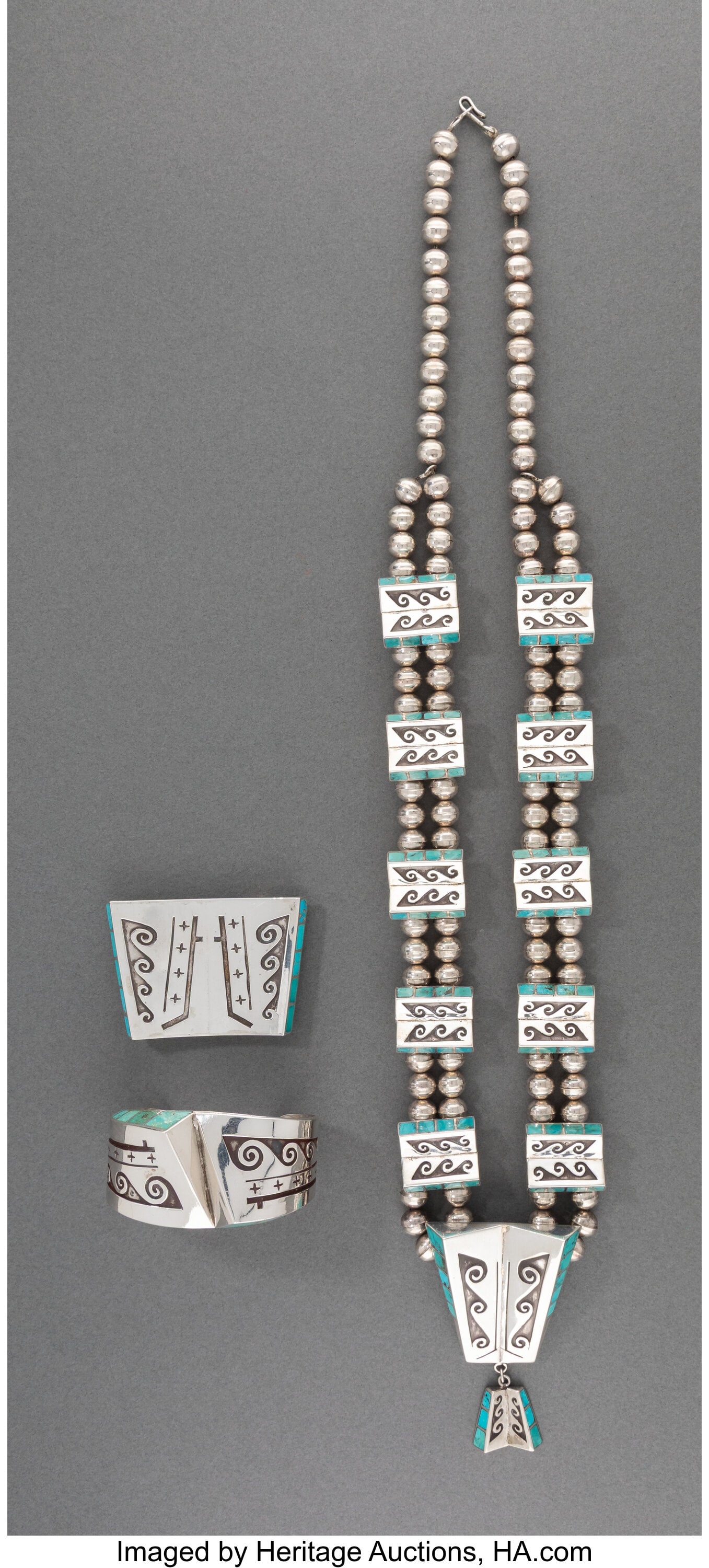 A Navajo Jewelry Suite c. 1990 - 2010 includin: A Navajo Jewelry Suite c. 1990 - 2010 including a belt buckle and bracelet, each stamped JNJ (Jackson Jarrett Nez), and a necklace, silver, turquoise Length of