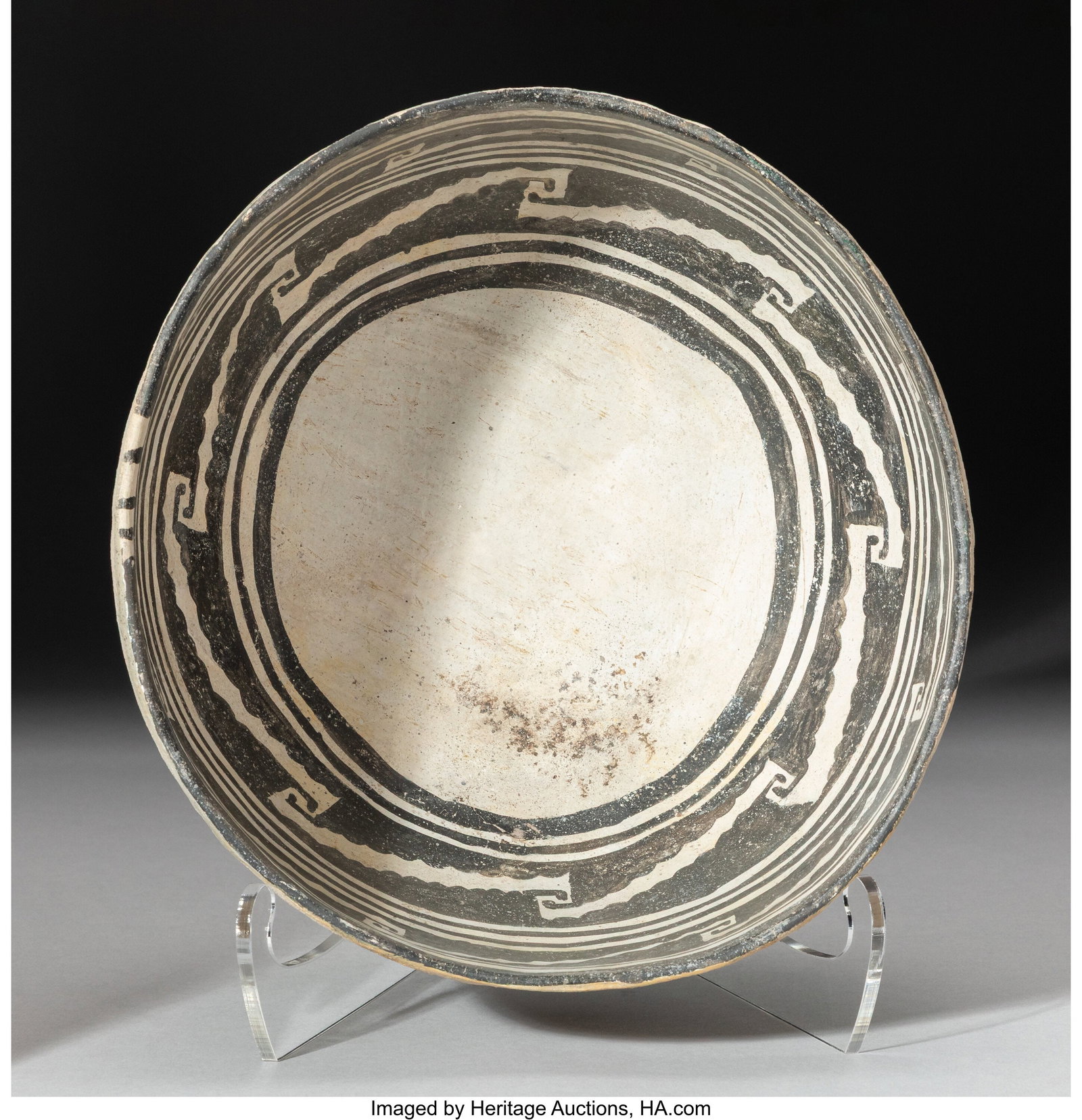 A Snowflake Black-on-White Bowl c. 1175 - 1325 : A Snowflake Black-on-White Bowl c. 1175 - 1325 AD clay, paint Diameter: 9 &frac12; inches HID03101062020 © 2026 Heritage Auctions | All Rights Reserved www&period