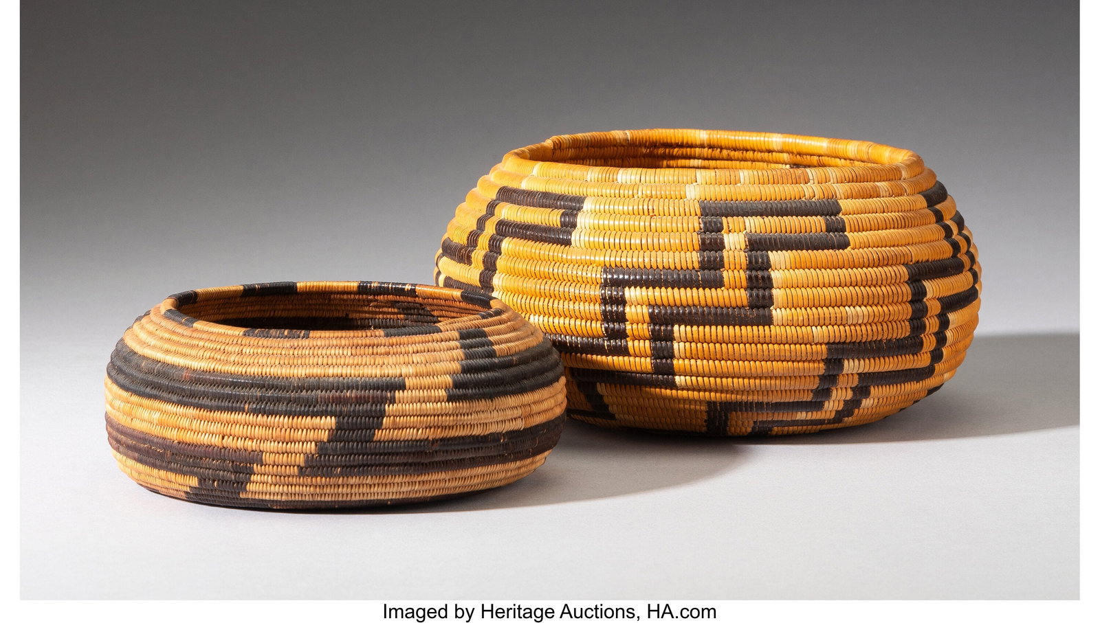 Two Pomo Coiled Jars c. 1910 and 1920 willow, : Two Pomo Coiled Jars c. 1910 and 1920 willow, juncas, bracken fern root Diameters: 5 &frac14; and 7 inches HID03101062020 © 2026 Heritage Auctions | All