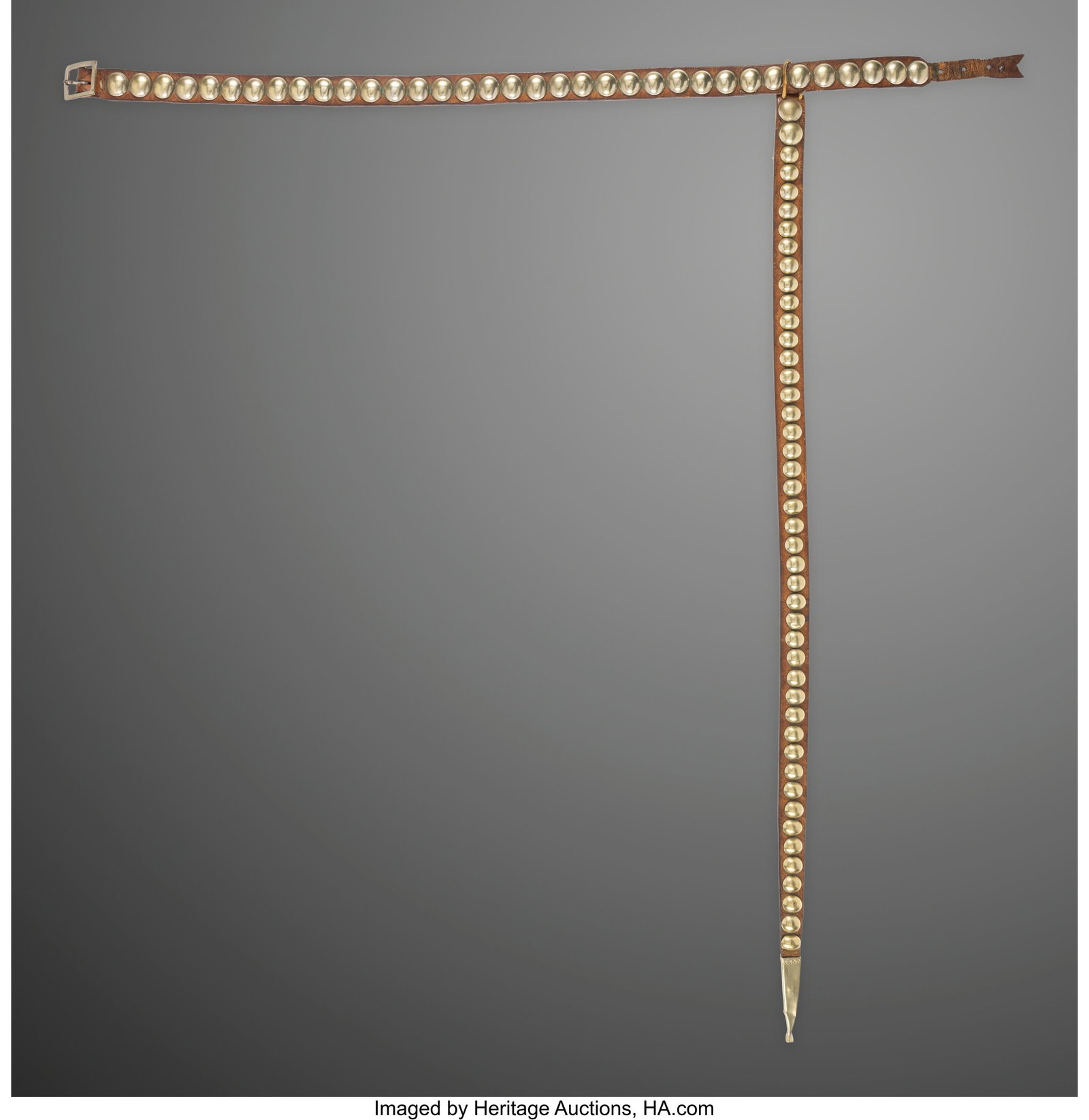 A Southern Plains Woman's Concho Belt c. 1880 : A Southern Plains Woman's Concho Belt c. 1880 commercial leather, German silver, cotton string, metal clasp Lengths: belt, 40 &frac12; inches;