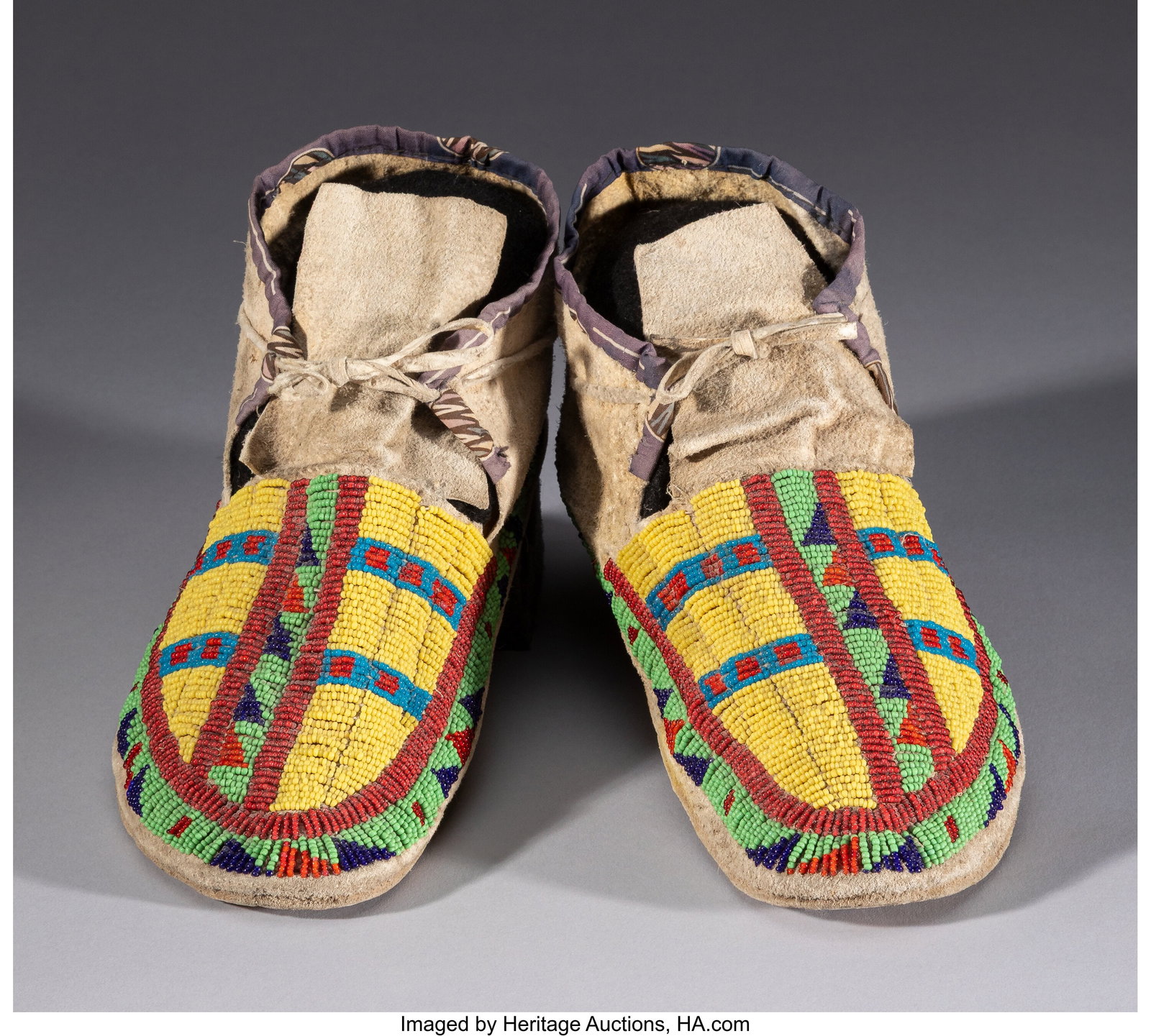 A Pair of Plains Beaded Hide Moccasins c. 1900  (1 of 2)