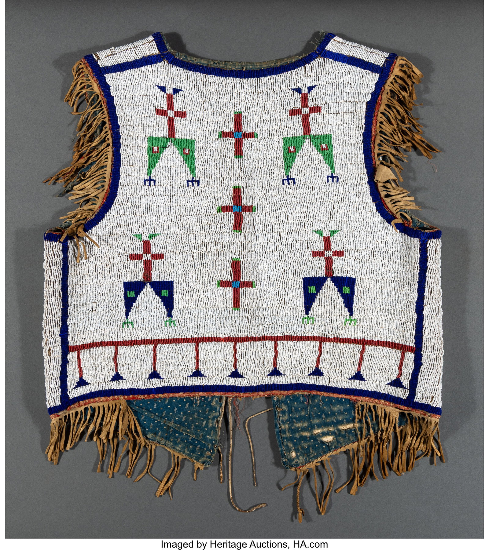 A Sioux Beaded Hide Vest c. 1890 hide, glass  (1 of 2)