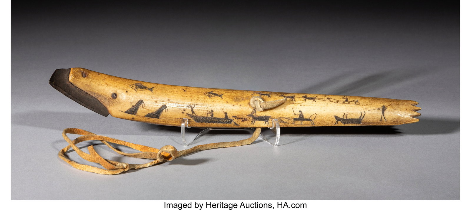 An Eskimo Hide Scraper c. 1890 bone, pigment,  (1 of 2)