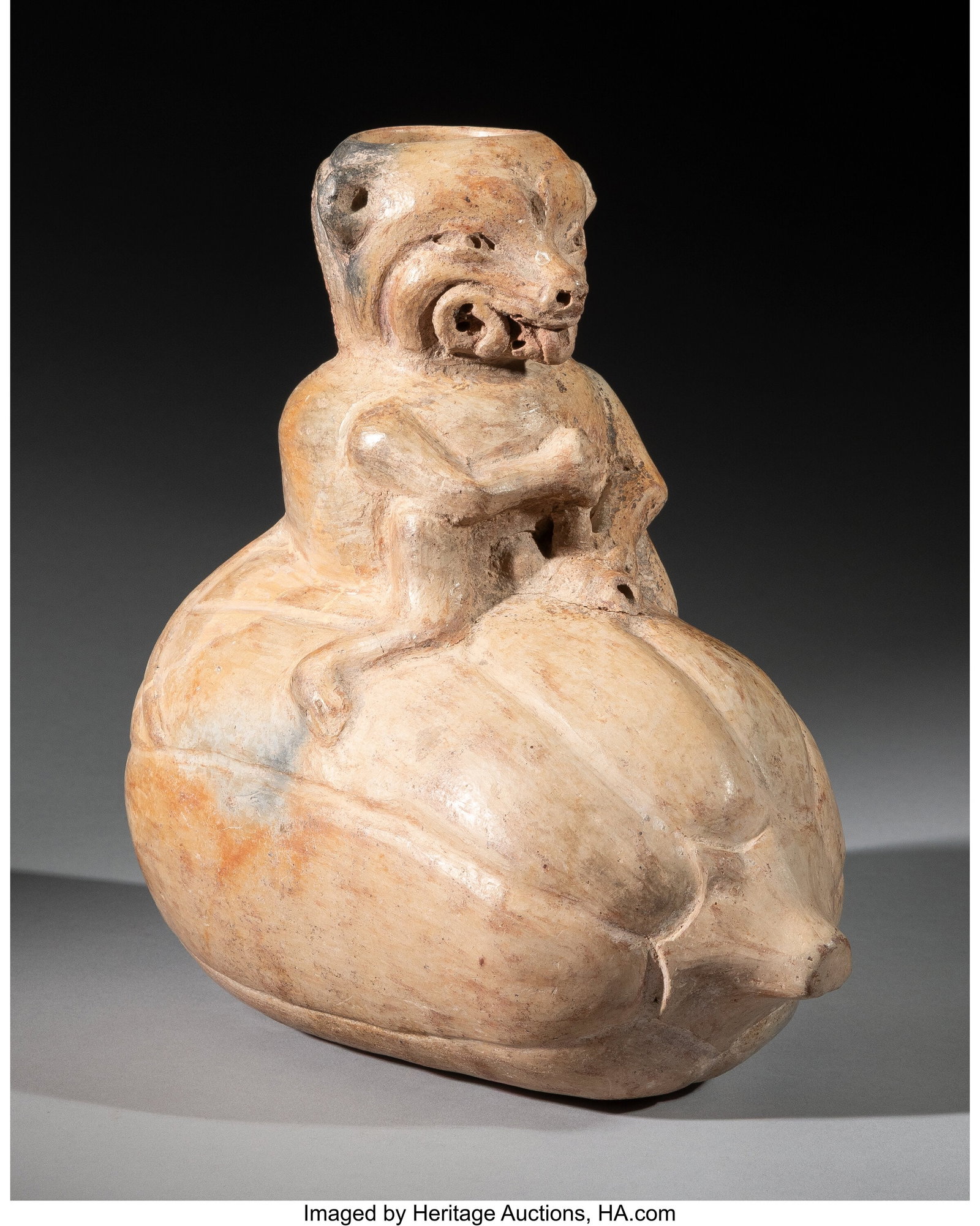 An Olmecoid Vessel in Form of an Opossum and Squ: An Olmecoid Vessel in Form of an Opossum and Squash Mexico, probably Preclassic, c. 1200–400 BC Cream-colored ceramic. This highly unusual vessel depicts an opossum sea