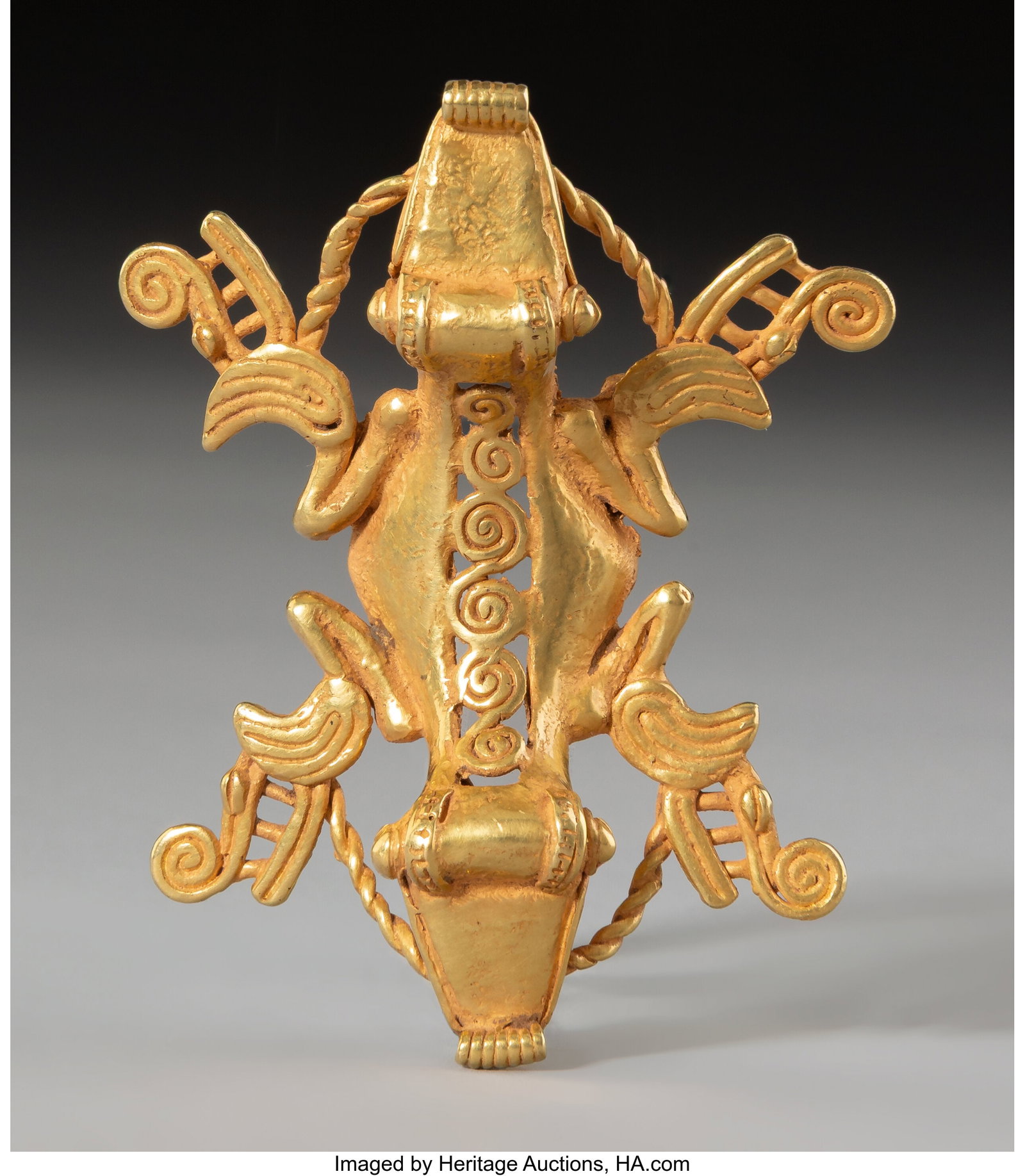A Double-Headed Crocodile Pendant Panama, proba: A Double-Headed Crocodile Pendant Panama, probably Coclé or Greater Chiriquí, c. 800–1200 AD Hollow cast in rich gold alloy, this finely detailed pendant t