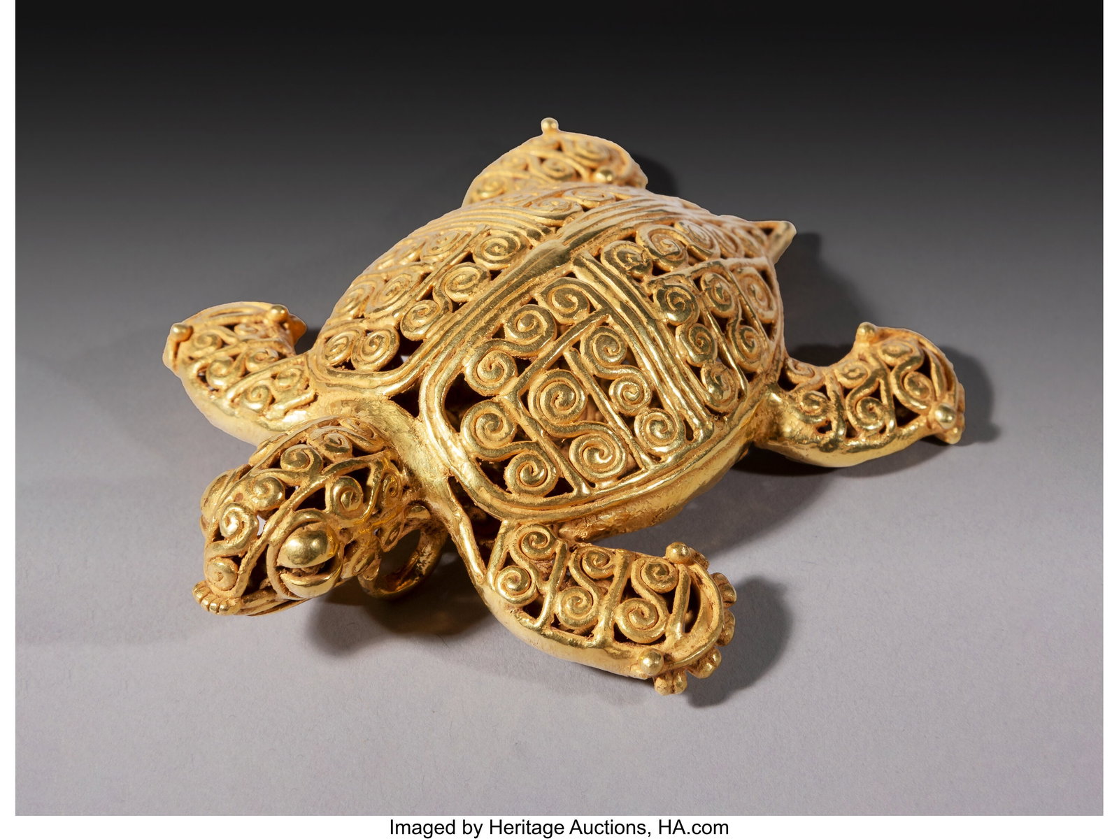 A Large Gold Turtle Pendant Panama, probably Co: A Large Gold Turtle Pendant Panama, probably Coclé or Greater Chiriquí, c. 800–1200 AD The turtle's shell is divided into four quadrants and richly covered with 