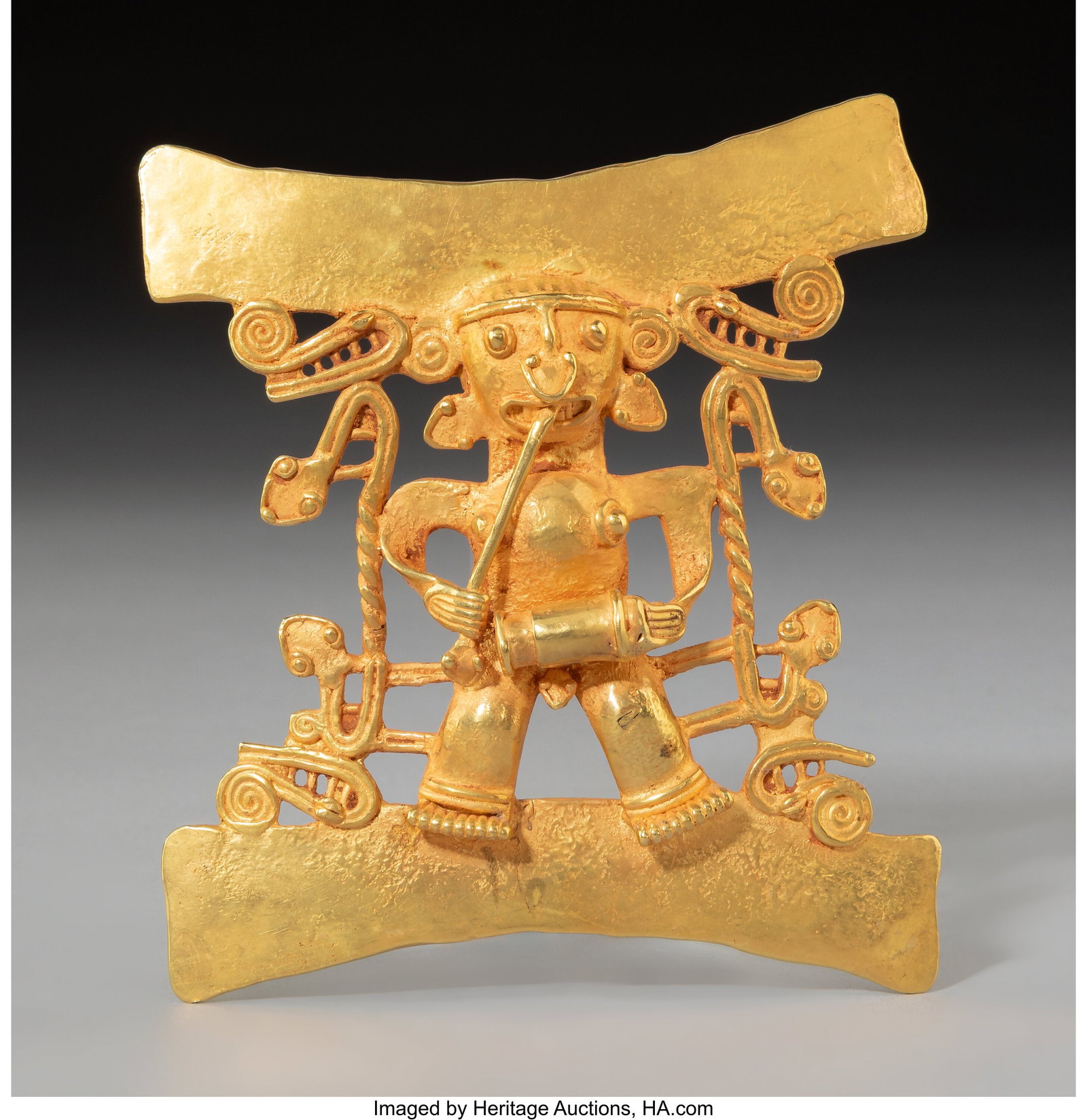 A Large and Important Gran Coclé Gold Pendant : A Large and Important Gran Coclé Gold Pendant Panama, c. 800–1200 AD Hollow cast in tumbaga, this remarkable pendant takes the form of a standing male framed above and 