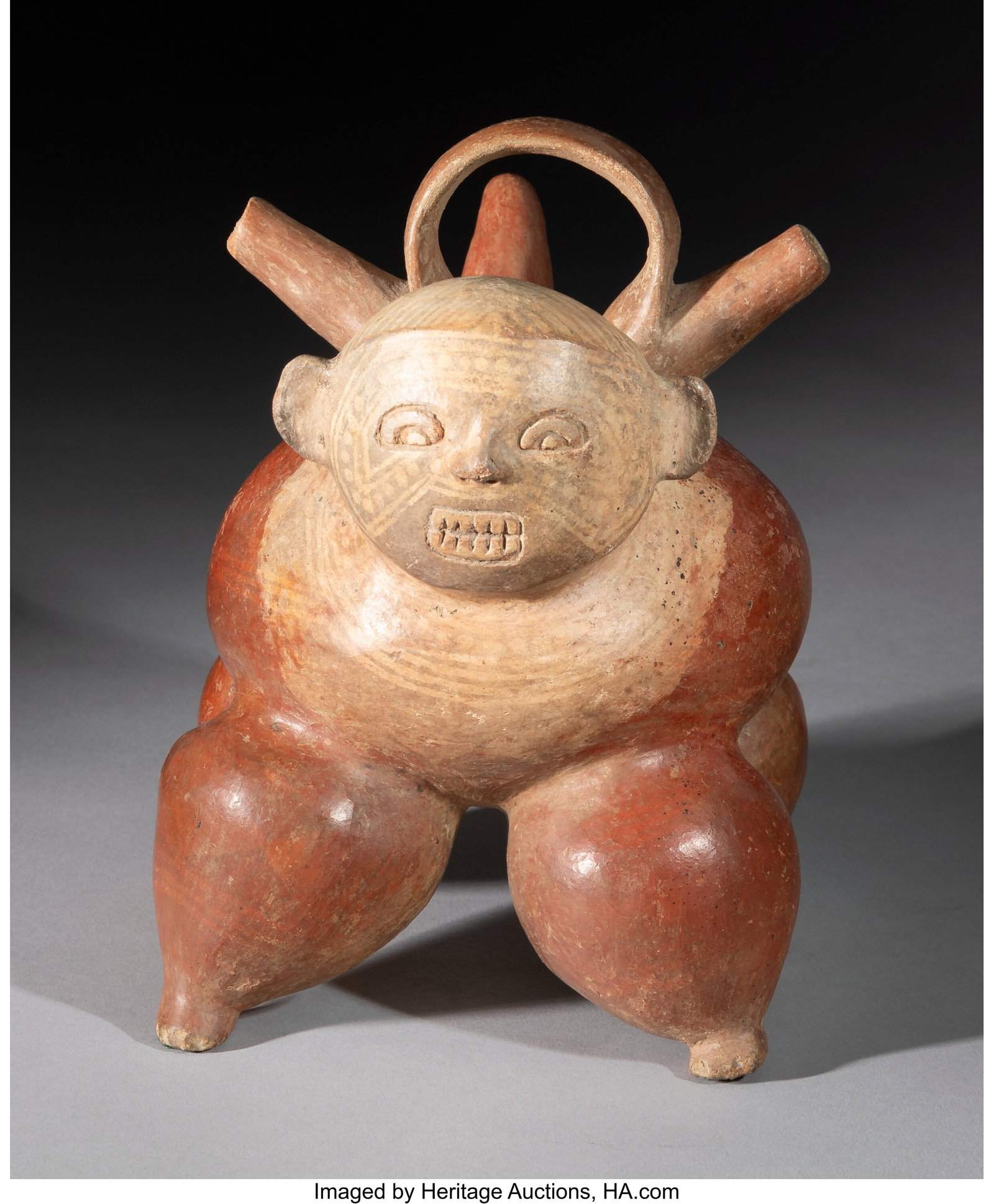 A Calima Zoomorphic Vessel Colombia, c. 200 BC-200 AD: A Calima Zoomorphic Vessel Colombia, c. 200 BC–200 AD Hollow ceramic with burnished red-brown slip over the legs and most of the body, while the head and shoulders are finished in cream and embellis