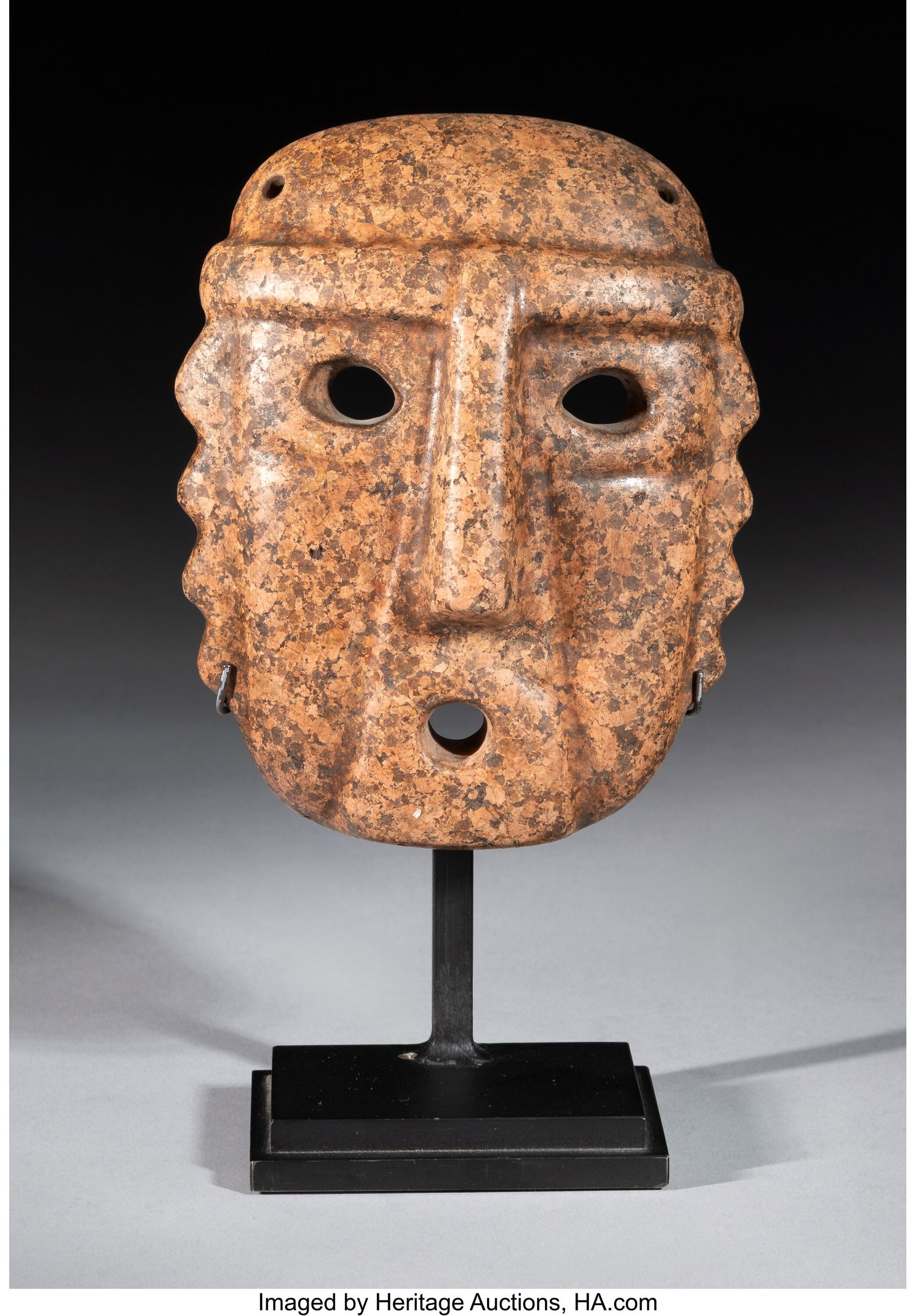 An Alamito Stone Maskette Northwest Argentina, : An Alamito Stone Maskette Northwest Argentina, Condorhuasi-Alamito culture, c. 400 BCE–500 CE Carved from a remarkable mottled copper-colored hardstone and polished to a smoot