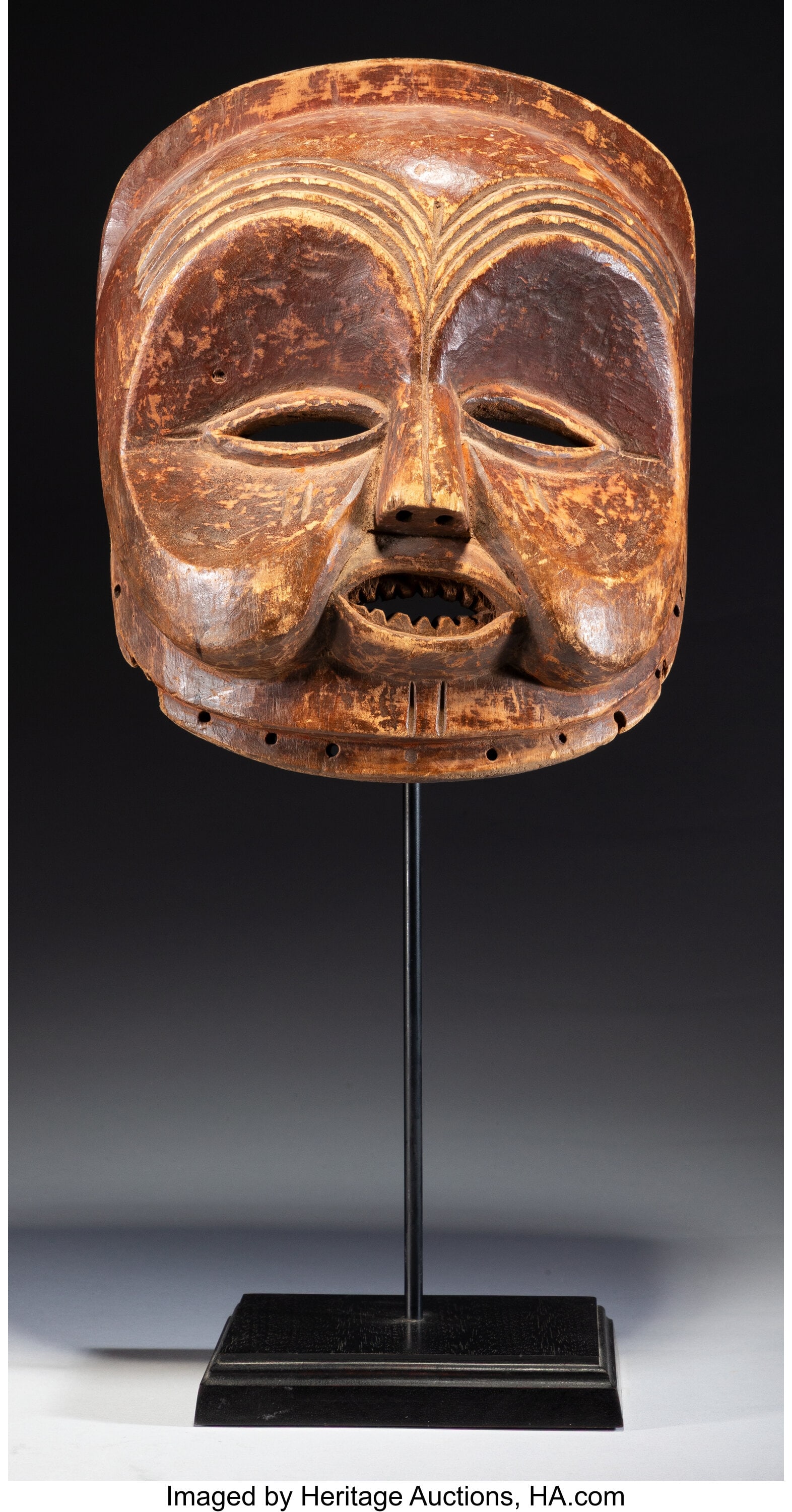 A Mbunda Sachihongo Mask Angola/Zambia, c. late: A Mbunda Sachihongo Mask Angola/Zambia, c. late 19th to early 20th century This powerful Sachihongo mask, the most important male spirit mask of the Mbunda, is carved with