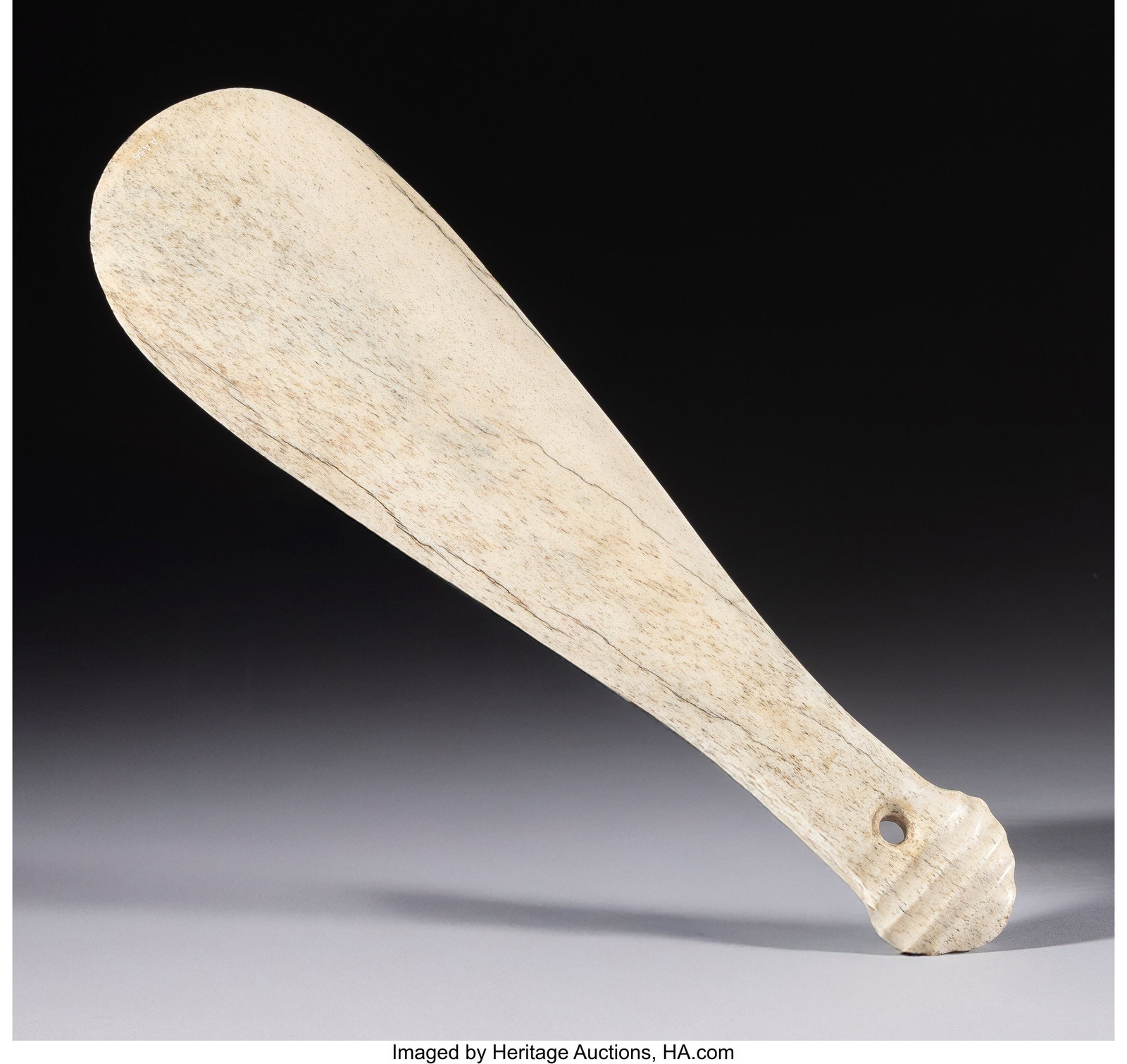 A Fine Early Maori Hand Club (Patu Paraoa) New : A Fine Early Maori Hand Club (Patu Paraoa) New Zealand, c. 1820 This elegant hand club is carved whalebone in the classic form of the patu paraoa, with a lozenge-shaped bl