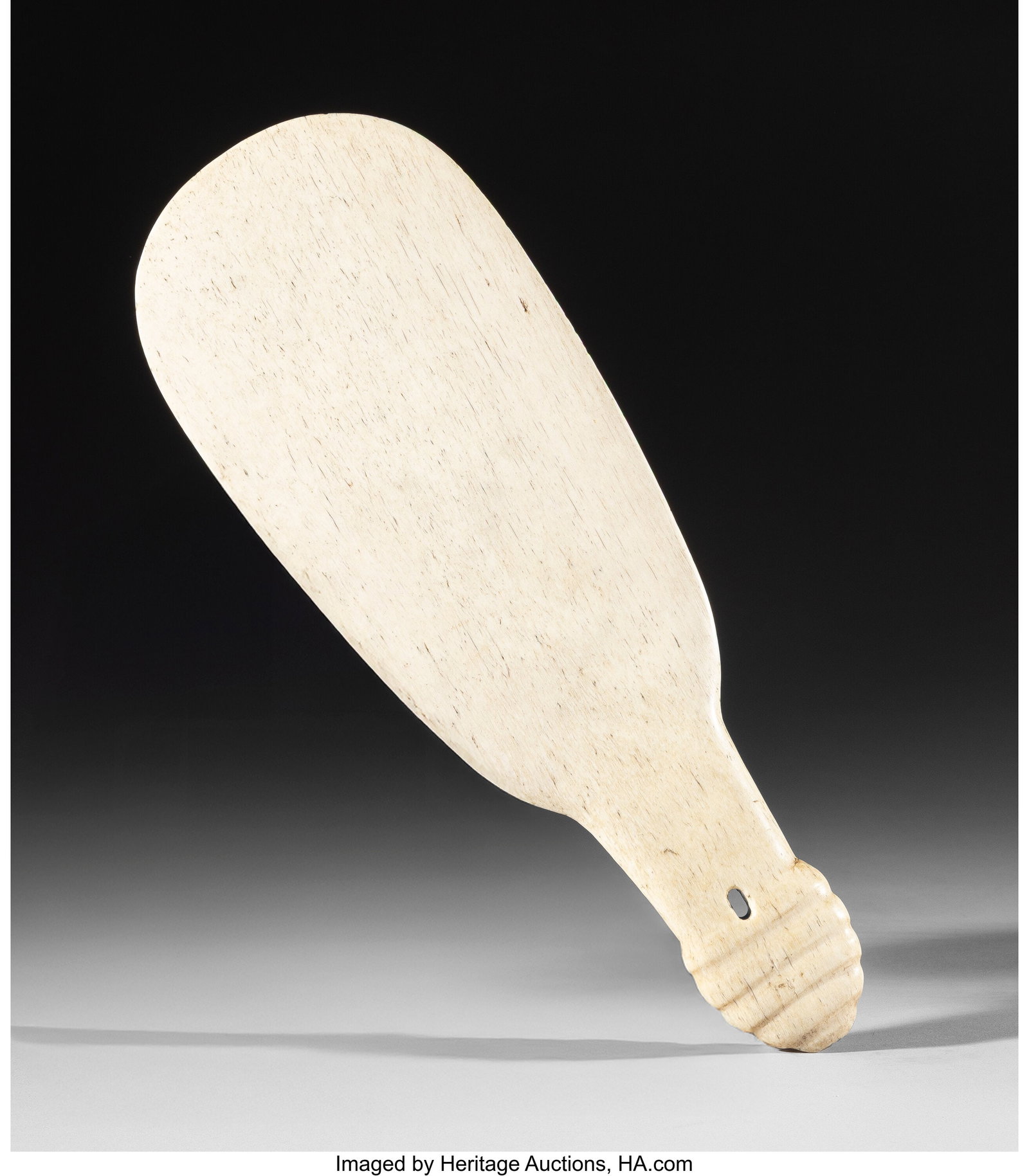 A Maori Hand Club (Patu Paraoa) New Zealand, Po: A Maori Hand Club (Patu Paraoa) New Zealand, Polynesia, c. 1850 This hand club is carved in a slightly oblong form, broad through the blade and tapering neatly to th