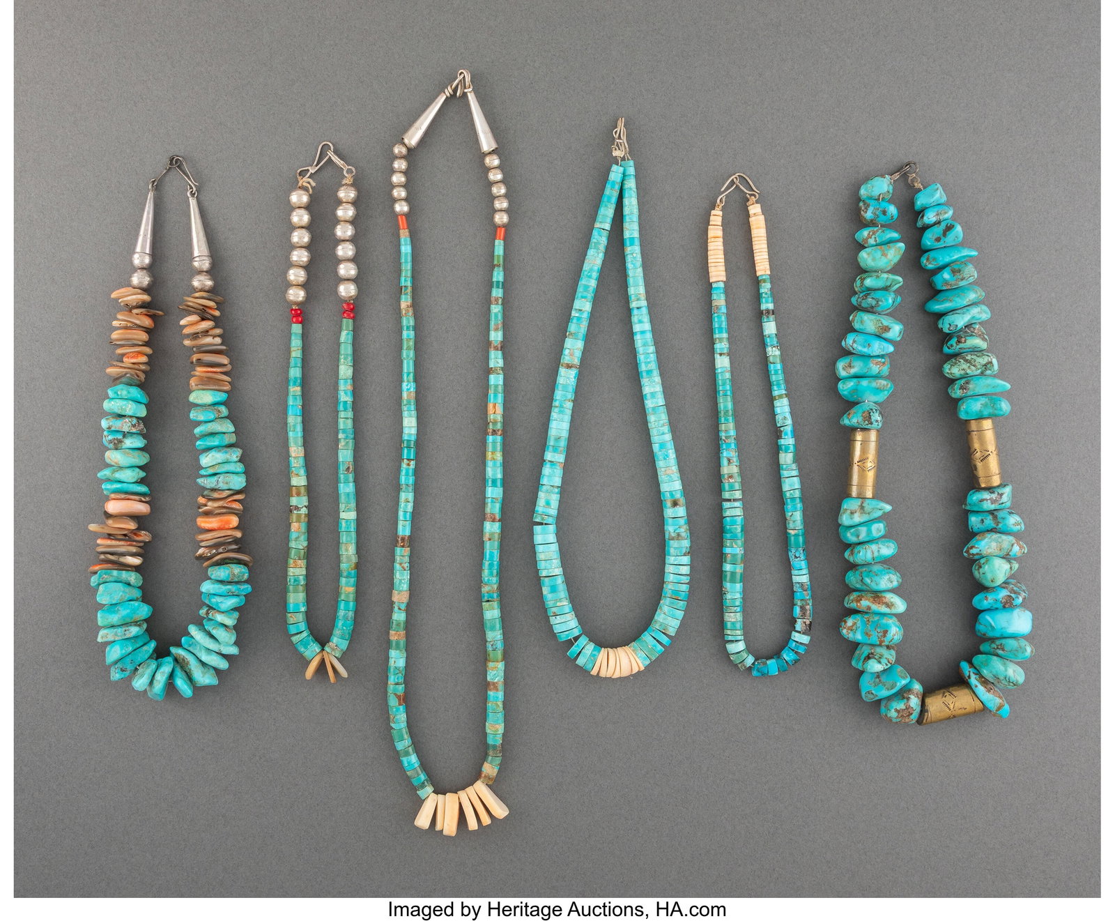 Six Pueblo Necklaces c. 1985 silver, brass, tu: Six Pueblo Necklaces c. 1985 silver, brass, turquoise, abalone, shell, coral, glass beads Lengths: ranging from 8 to 2 &frac12; inches HID0310