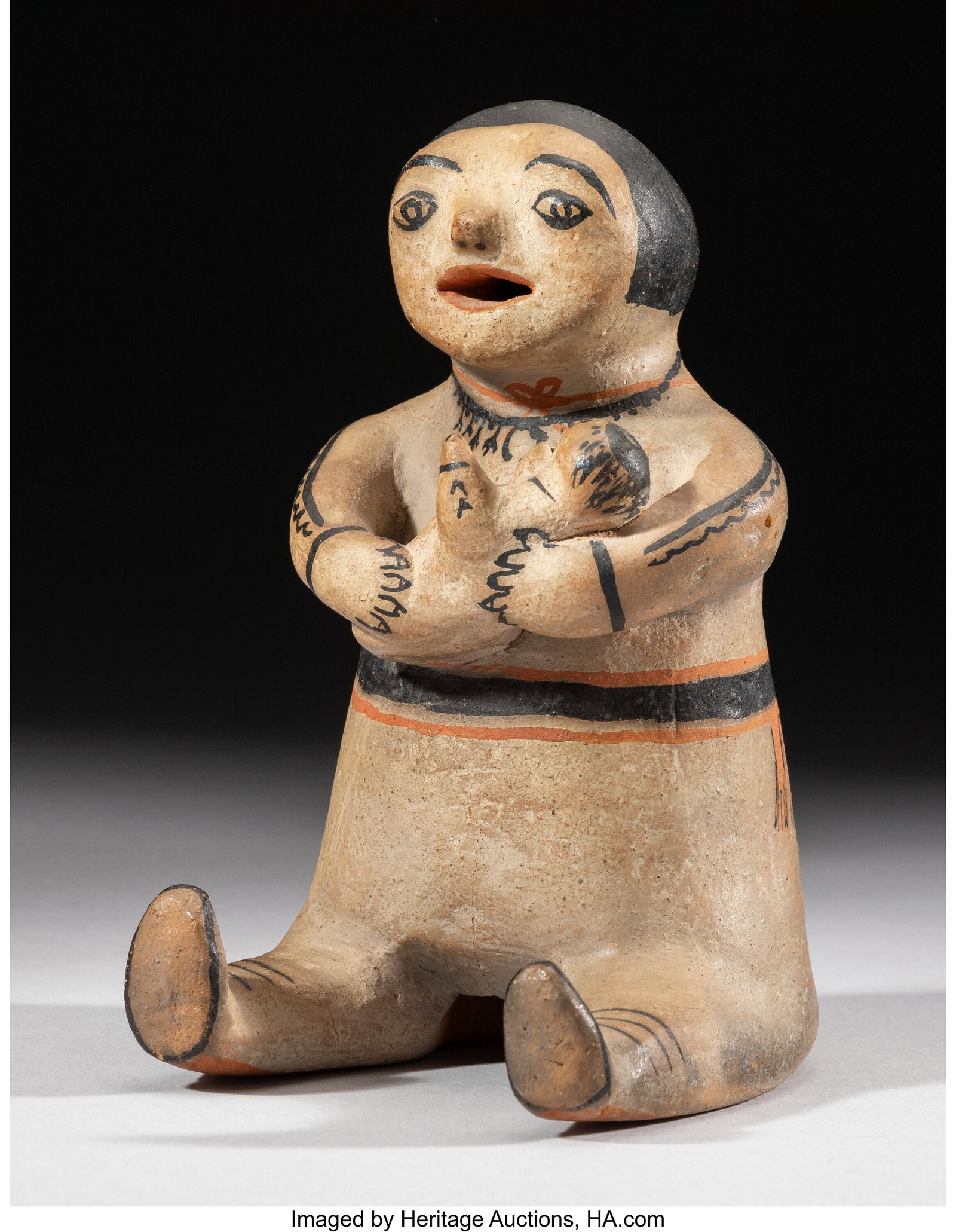 A Cochiti Polychrome Storyteller c. 1950 clay: A Cochiti Polychrome Storyteller c. 1950 clay, paint Height: 6 &frac14; inches HID03101062020 © 2026 Heritage Auctions | All Rights Reserved