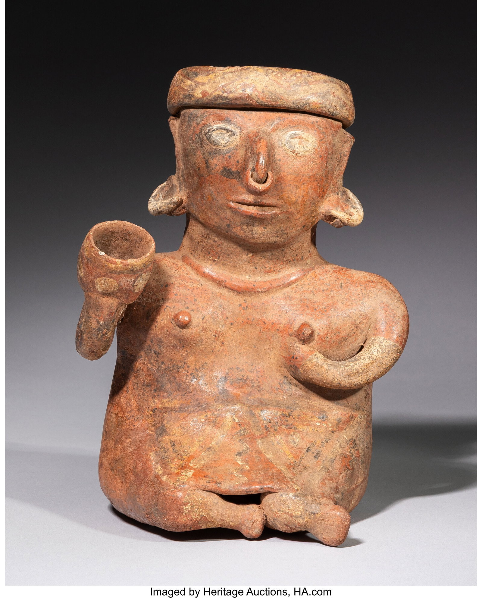 A Nayarit Seated Female Figure Height: 11 ½ i: A Nayarit Seated Female Figure Height: 11 &frac12; inches HID03101062020 © 2026 Heritage Auctions | All Rights Reserved