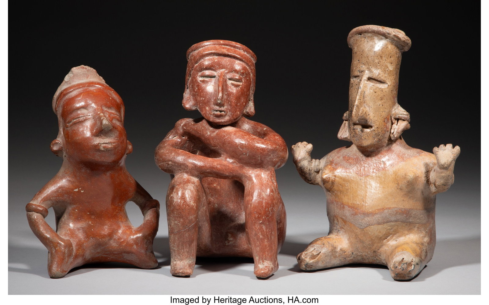 Three Jalisco Seated Figures Heights: ranging : Three Jalisco Seated Figures Heights: ranging from 7 &frac12; to 9 inches HID03101062020 © 2026 Heritage Auctions | All Rights Reserved