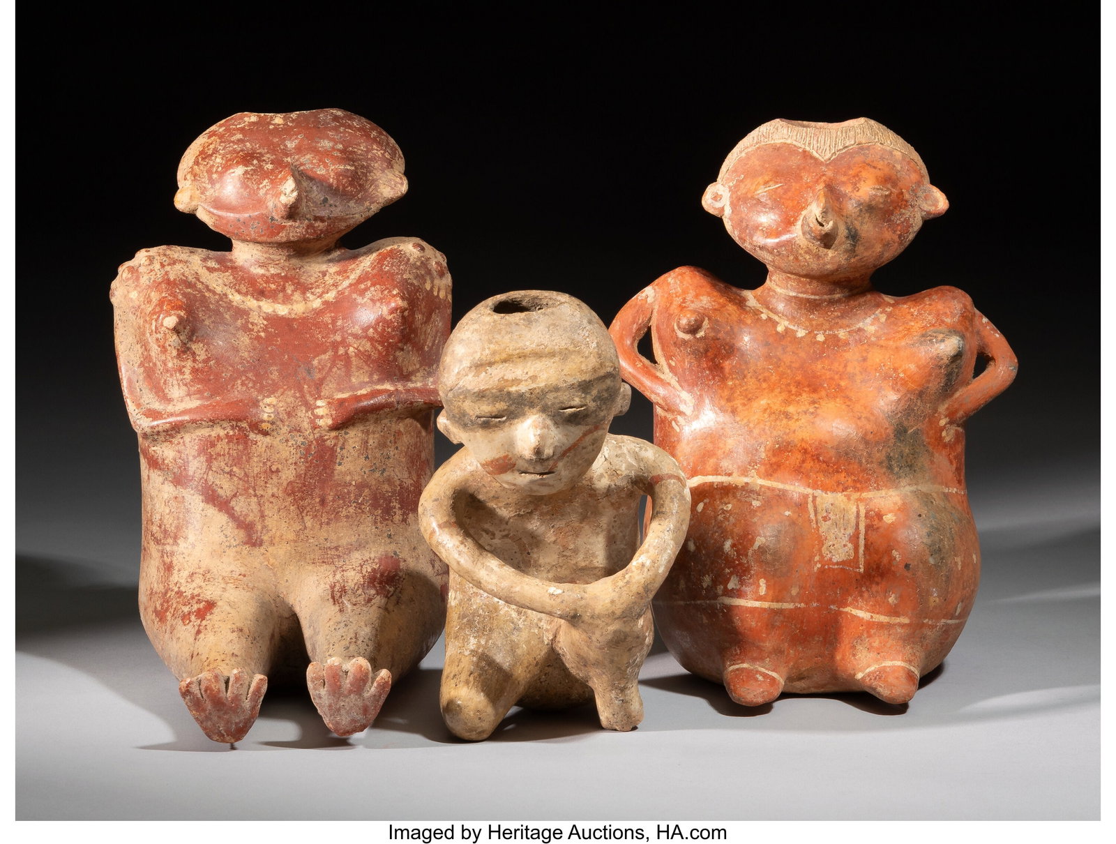 Three Chinesco Figures Nayarit, West Mexico, c: Three Chinesco Figures Nayarit, West Mexico, c. 250 BC - 250 AD Each hollow ceramic with red and cream slips. The smallest leaning far forward, kneeling on one