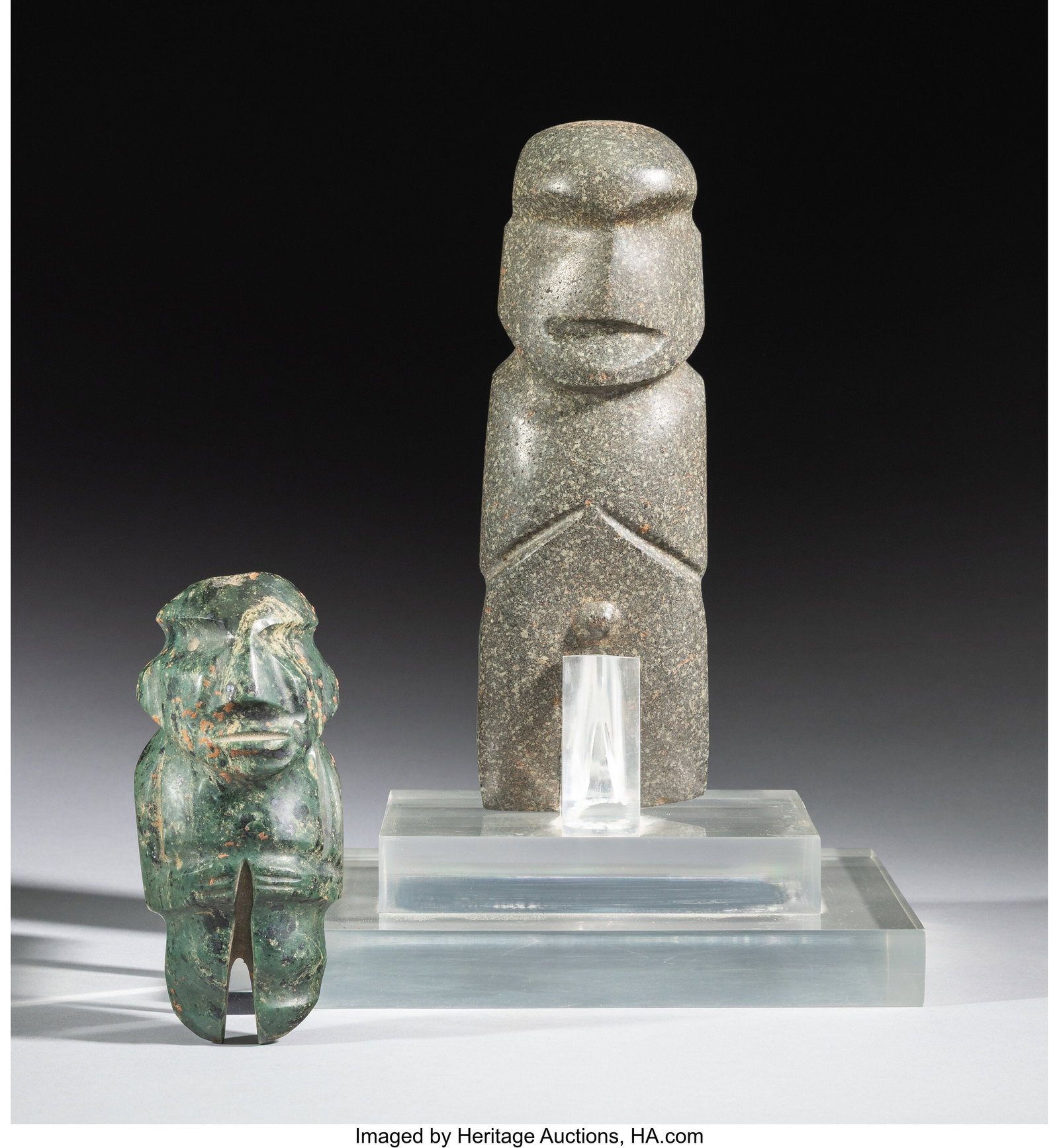 Two Mezcala Stone Figures Guerrero, Mexico, c: Two Mezcala Stone Figures Guerrero, Mexico, c. 700-200 BC One a mottled blue-green serpentine with greater detail, in form of a standing figure with hands to abdomen,