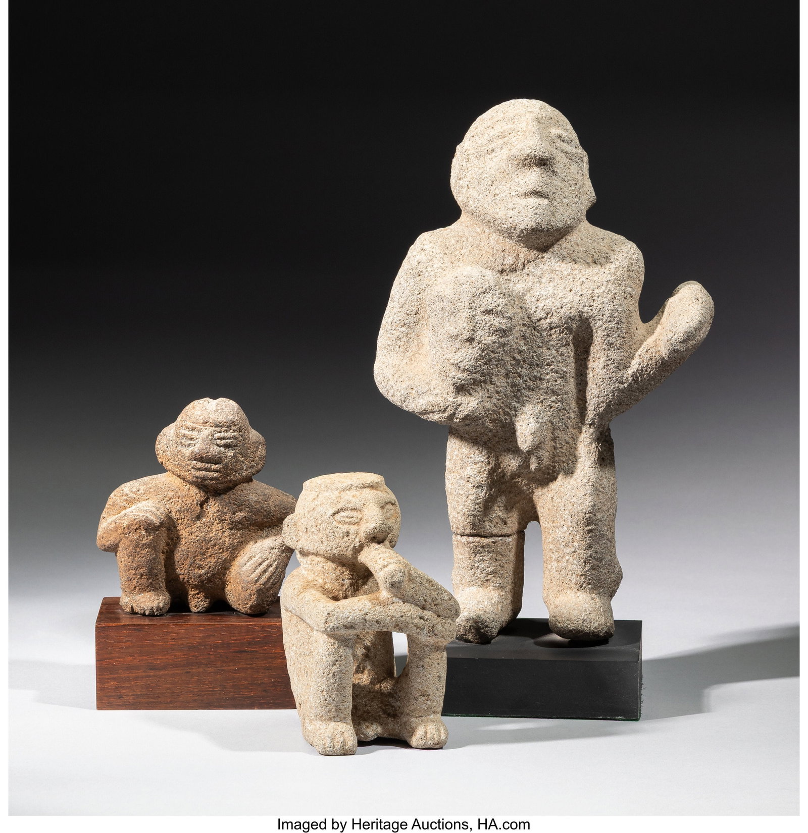 Three Costa Rican Stone Figures Provenance: Pr: Three Costa Rican Stone Figures Provenance: Property from the Private Collection of Dr. John Ross, Sr. Heights: ranging from 4 to 11 &frac12; inches