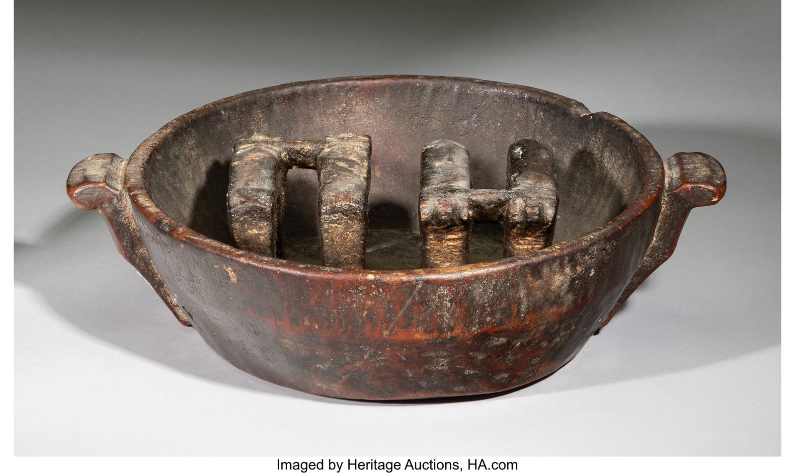 An Andean Wedding Bowl Carved with Two Yoked Pai: An Andean Wedding Bowl Carved with Two Yoked Pairs of Cattle Wood with patina from use. Provenance: Property from the Private Collection of Dr. John Ross, Sr. Width&co