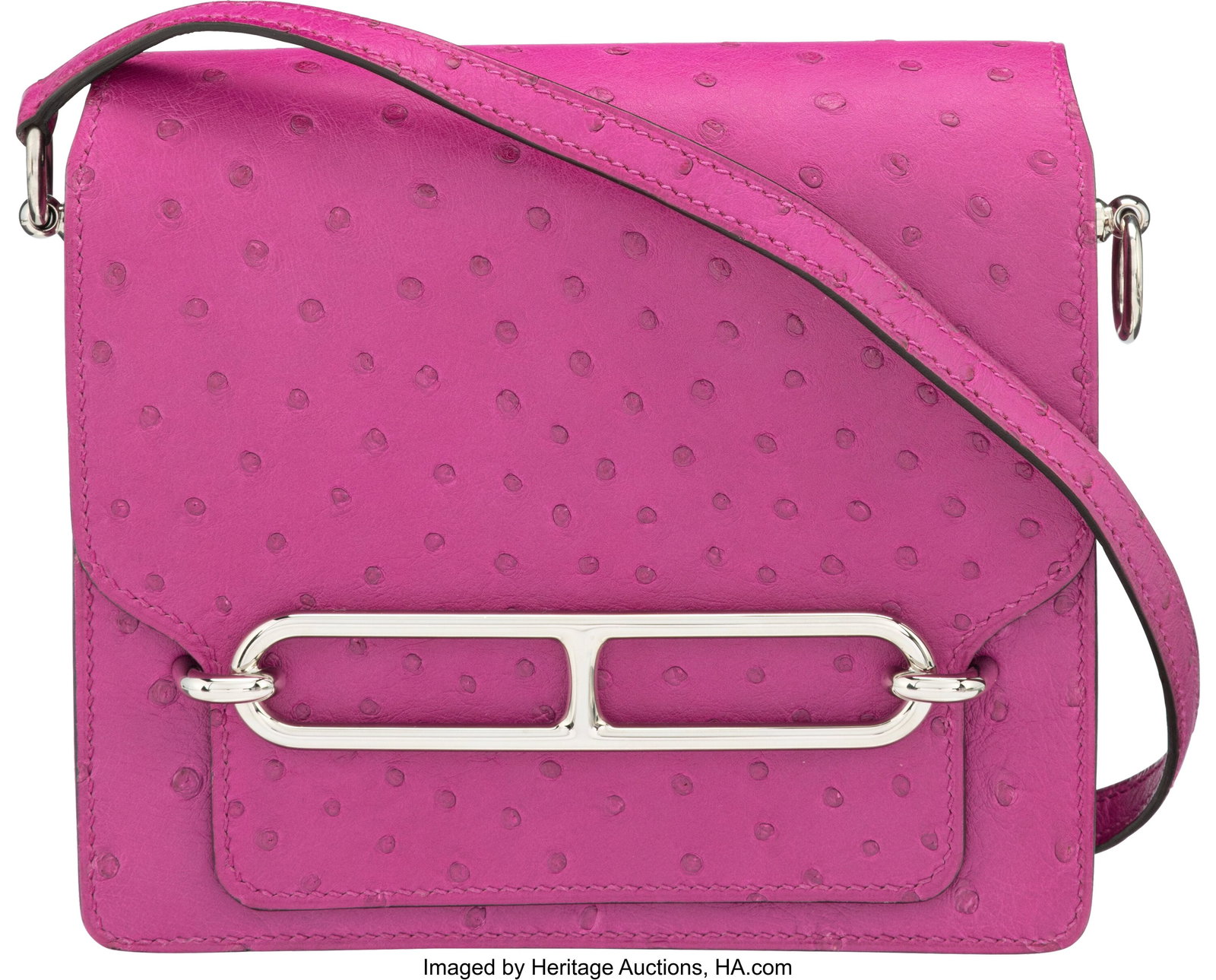 Hermès 18cm Rose Pourpre Ostrich Mini Roulis Ba: Hermès 18cm Rose Pourpre Ostrich Mini Roulis Bag with Palladium Hardware D, 2019 Condition: 1 7" Width x 6" Height x 2" Depth This bag is done in Rose Pourpre Ostrich with Palladium