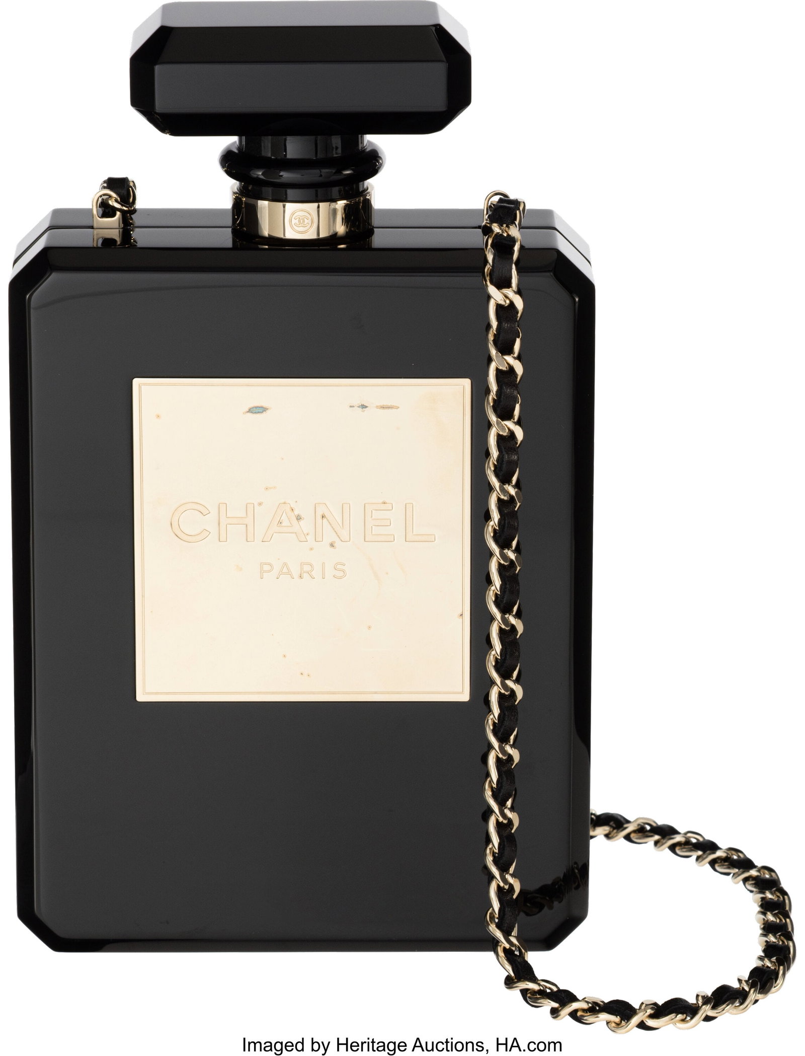 Chanel Black Lucite N°5 Perfume Bottle Minaudière with Gold Hardware: Chanel Black Lucite N°5 Perfume Bottle Minaudière with Gold Hardware Resort 2014 Condition: 3 5" Width x 8" Height x 1.5" Depth This bag is done in Black Plexiglass with Gold Hardware, featuring a w
