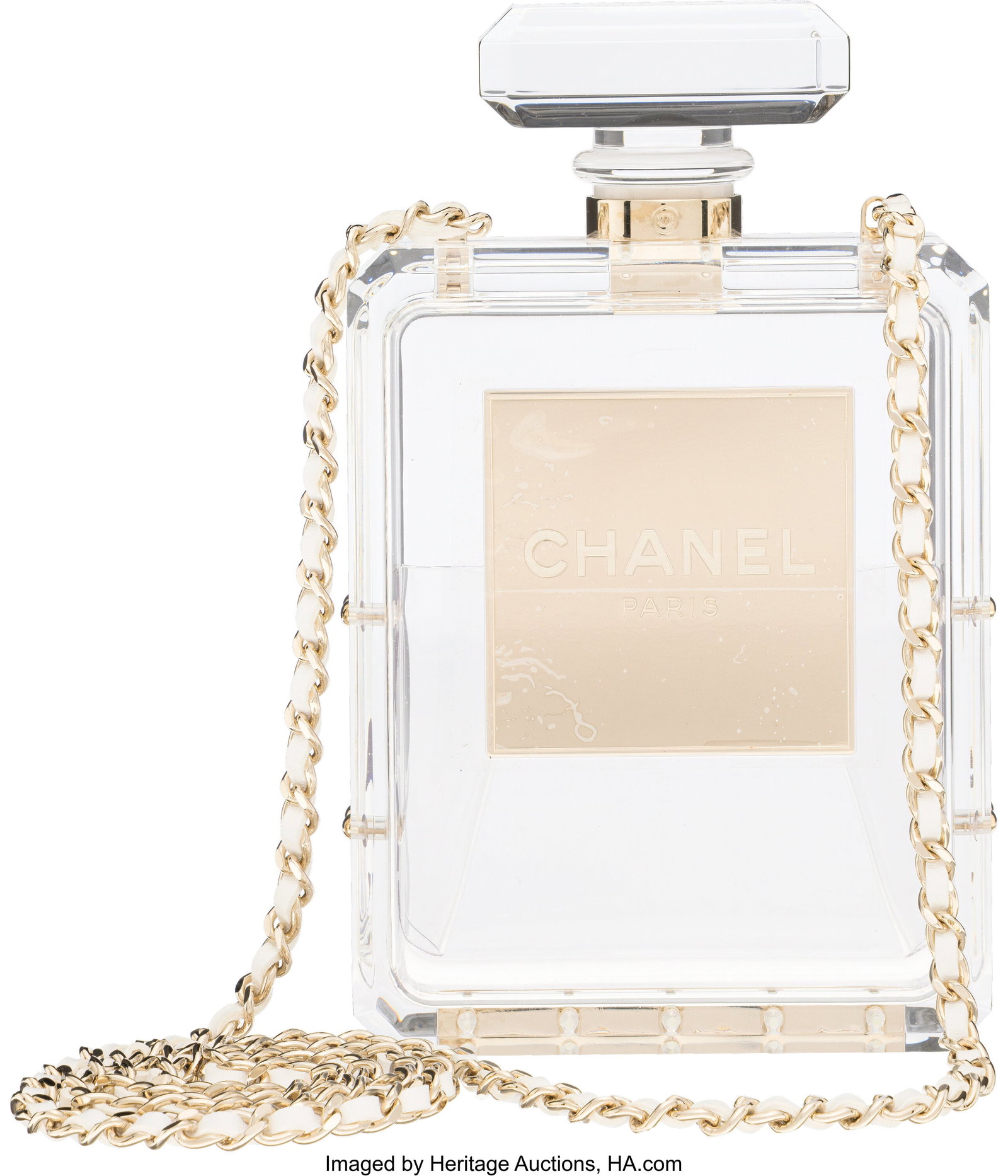 Chanel Clear Lucite N°5 Perfume Bottle Minaudière with Gold Hardware: Chanel Clear Lucite N°5 Perfume Bottle Minaudière with Gold Hardware Resort 2014 Condition: 1 5" Width x 8" Height x 1.5" Depth This bag is done in Clear Lucite with Gold Hardware, featuring a woven