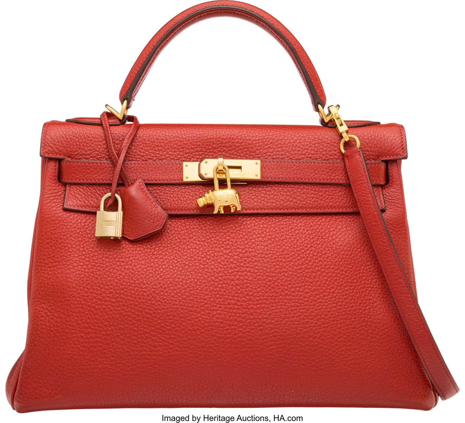 Hermès 32cm Rouge Vif Clemence Leather Kelly Re: Hermès 32cm Rouge Vif Clemence Leather Kelly Retourne Bag with Gold Hardware & Hippo Cadenas Padlock Charm I Square, 2005 Condition: 4 12.5" Width x 8" Height x 4.