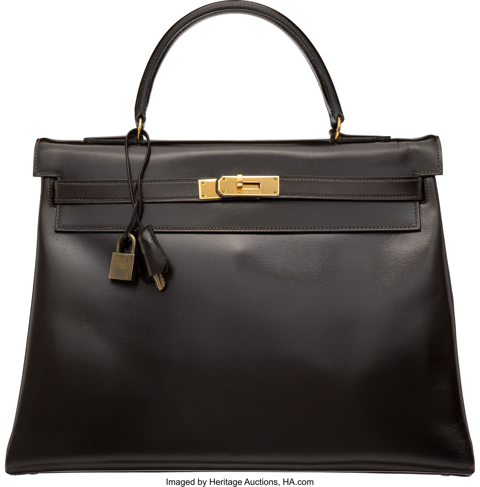 Hermès 35cm Ebene Box Calf Leather Kelly Retour: Hermès 35cm Ebene Box Calf Leather Kelly Retourne Bag with Gold Hardware K Circle, 1981 Condition: 2 13.5" Width x 10" Height x 5" Depth This bag is done in Ebene Box Calf Le