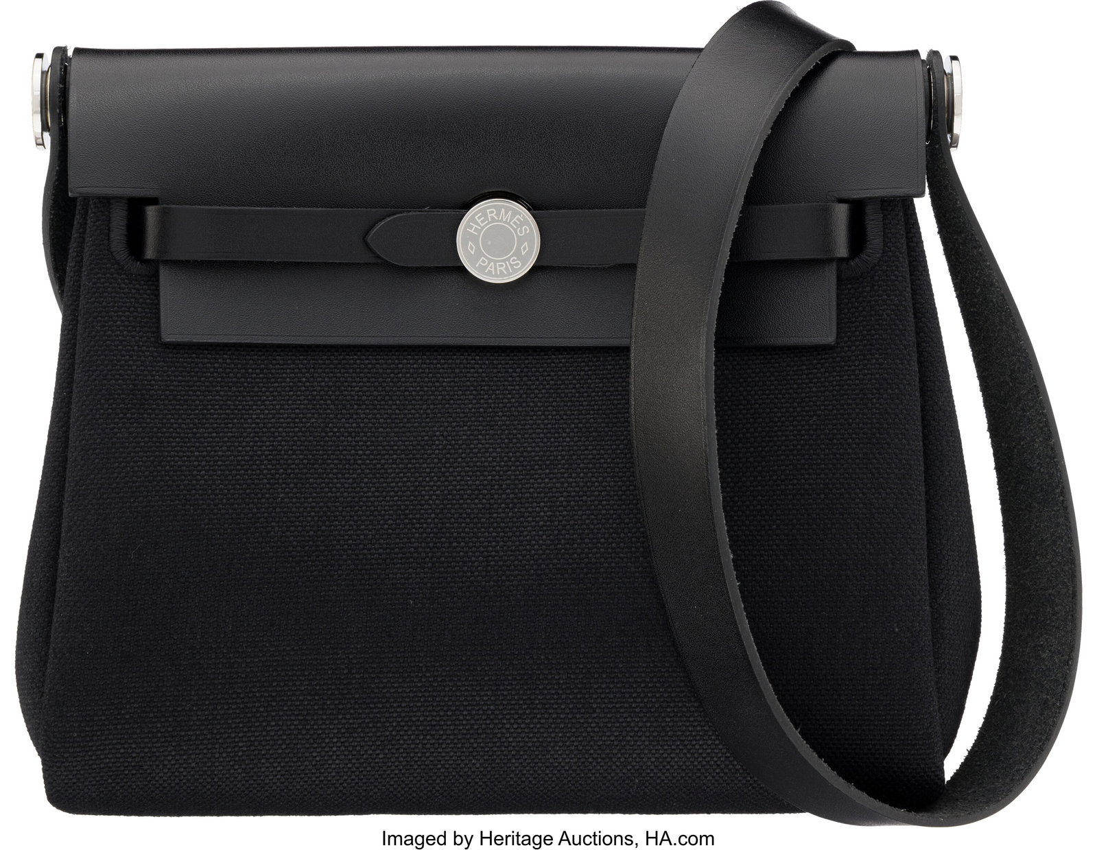 Hermès 20cm Black Vache Hunter Leather & Toile : Hermès 20cm Black Vache Hunter Leather & Toile Mini Herbag Zip with Palladium Hardware W, 2024 Condition: 1 7.5" Width x 7" Height x 3" Depth This bag is done in Black Va