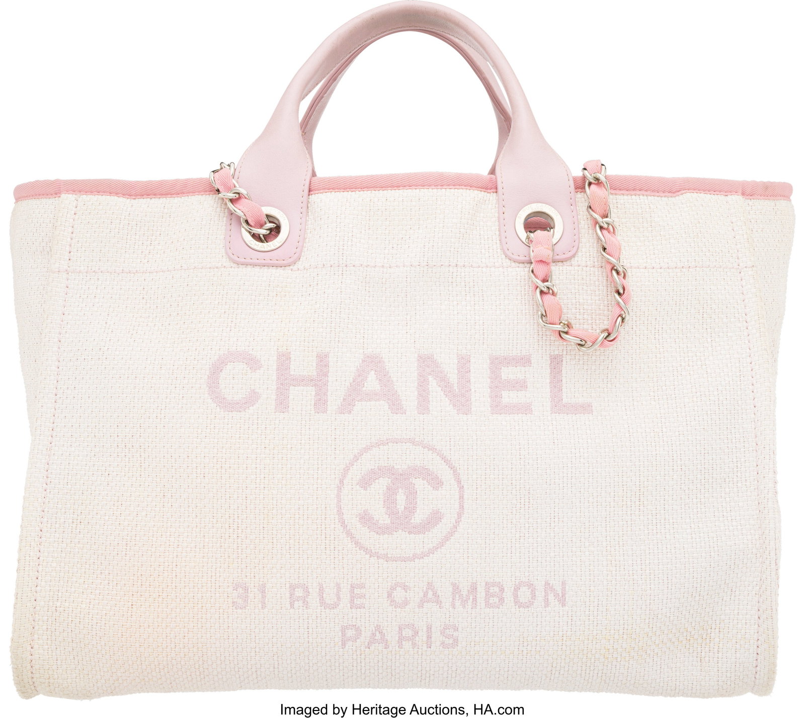 Chanel Pink Leather & White Canvas Medium Deauvi: Chanel Pink Leather & White Canvas Medium Deauville Tote with Gold Hardware Condition: 3 15" Width x 11.5" Height x 8" Depth This bag is done in White Canvas with Pink Leather Trim