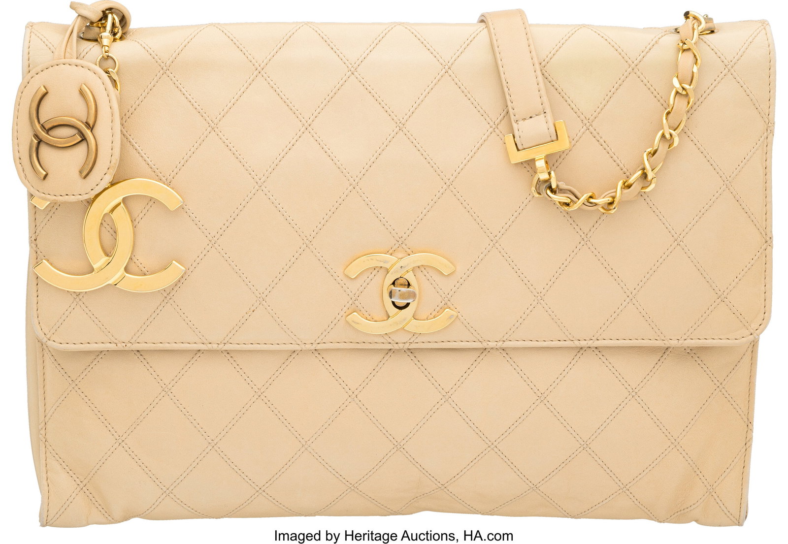 Chanel Vintage Beige Quilted Lambskin Leather Fl: Chanel Vintage Beige Quilted Lambskin Leather Flap Bag with Gold Hardware 1986-1988 Condition: 4 11.75" Width x 9" Height x 2.75" Depth This bag is done in Beige Quilted Lambskin