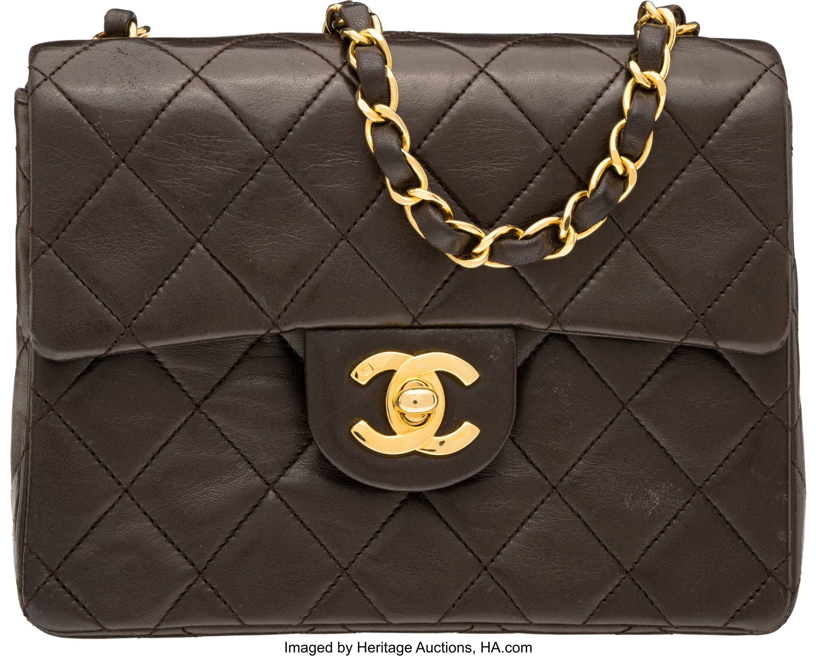 Chanel Vintage Brown Quilted Lambskin Leather Mi: Chanel Vintage Brown Quilted Lambskin Leather Mini Square Flap Bag with Gold Hardware 1991-1994 Condition: 2 7" Width x 5.5" Height x 2.5" Depth This bag is done in Brown Lambskin 
