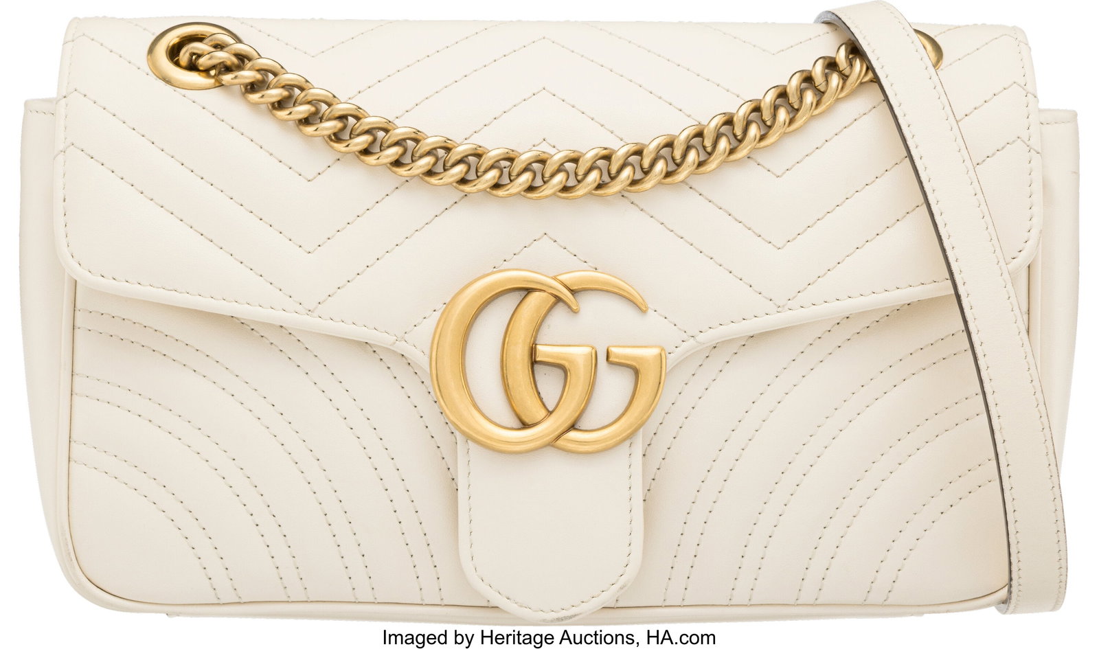 Gucci Ivory Quilted Leather Small Marmont Bag wi: Gucci Ivory Quilted Leather Small Marmont Bag with Aged Gold Hardware Condition: 2 10" Width x 6" Height x 3" Depth This bag is done in Ivory Quilted Leather with Aged Gold Hardware,