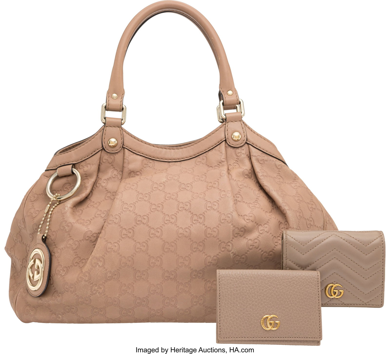 Gucci Set of Three: Pink Sukey Tote Bag and Two : Gucci Set of Three: Pink Sukey Tote Bag and Two Wallets See Extended Condition Report for Details. This lot includes: Gucci Pink Guccissima Leather Medium Sukey Tote Bag with Gold