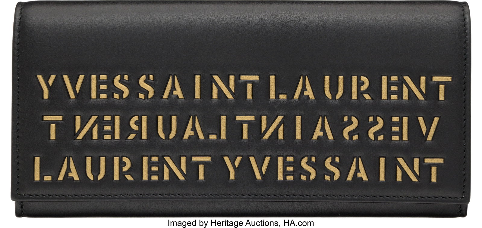 Yves Saint Laurent Black Leather Long Logo Walle: Yves Saint Laurent Black Leather Long Logo Wallet with Gold Hardware Condition: 2 7.5" Width x 3.5" Height x 1" Depth This wallet is done in Black Leather with Gold