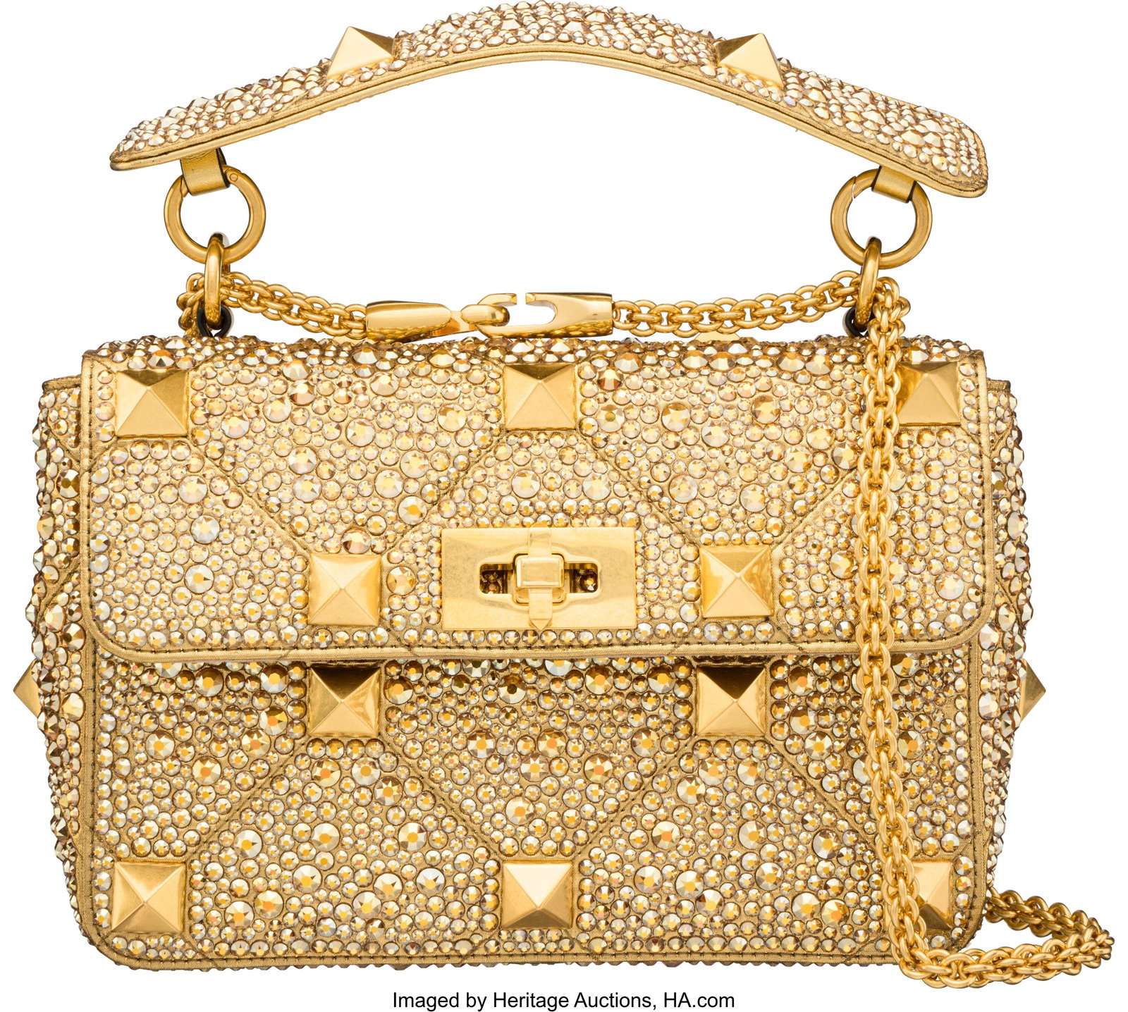 Valentino Garavani Gold Crystal Studded Medium R: Valentino Garavani Gold Crystal Studded Medium Roman Stud Bag with Aged Gold Hardware Condition: 1 9" Width x 6" Height x 3" Depth This bag is done in Gold Leather with Aged Gold