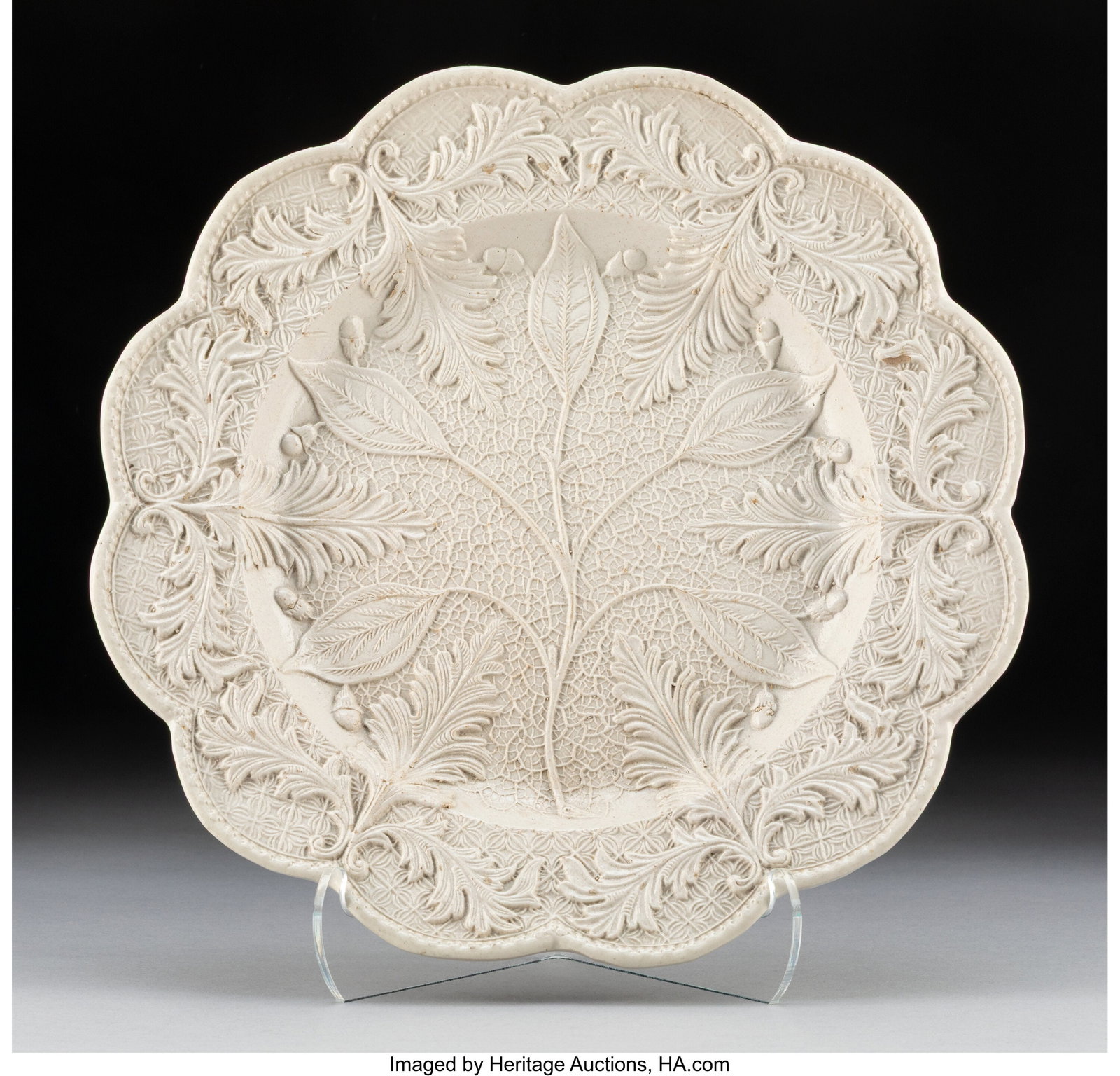 An English Stoneware Plate, 18th century 9-5/8 i: An English Stoneware Plate, 18th century 9-5/8 inches (24.4 cm) HID03101062020 © 2026 Heritage Auctions | All Rights Reserved www.HA.com/TexasAuc