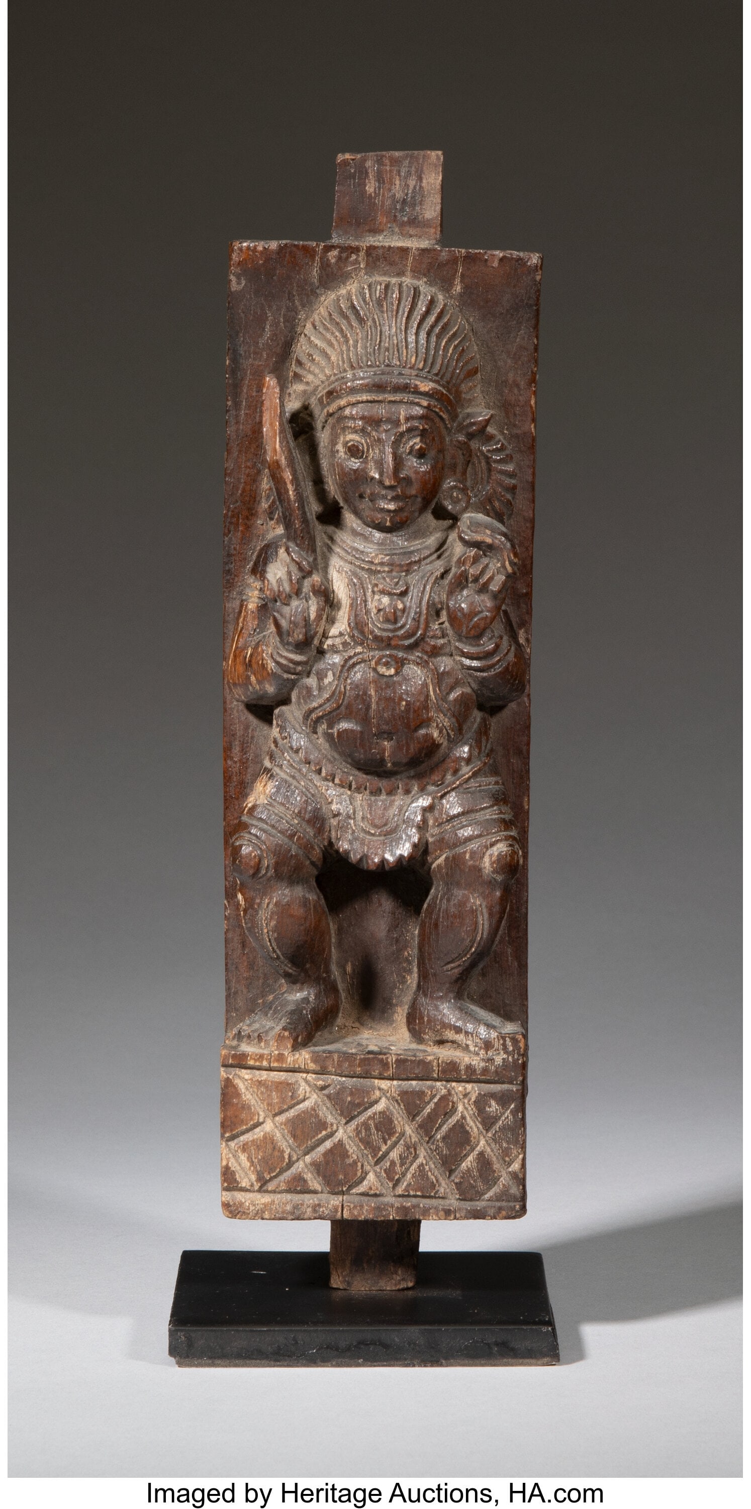 An Indian Carved Wood Figure of a Deity on Stand (1 of 2)