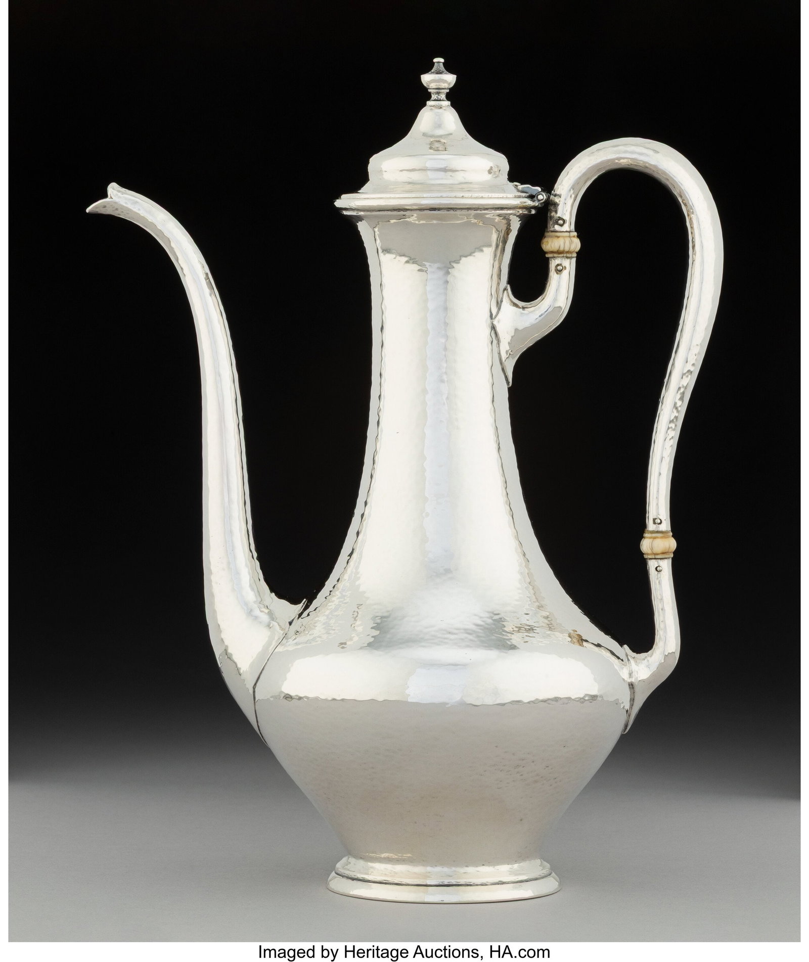 A Gorham Mfg. Co. Hand-Hammered Silver Black Cof: A Gorham Mfg. Co. Hand-Hammered Silver Black Coffee Pot, Providence, Rhode Island, 1915 Marks: (lion-anchor-G), STERLING, A9151, 1-1&s