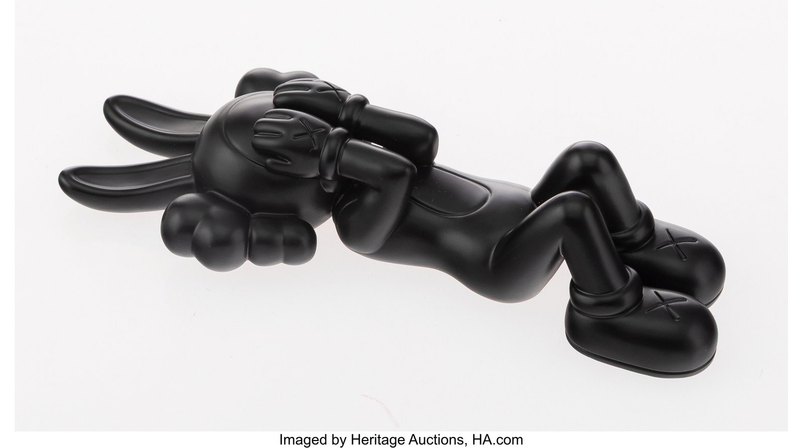 KAWS (b. 1974) Calm Night, 2022 Bronze 1-1/2 x 6: KAWS (b. 1974) Calm Night, 2022 Bronze 1-1/2 x 6-1/2 x 2-1/2 inches (3.8 x 16.5 x 6.3 cm) Ed. 187/250 Stamped on underside 