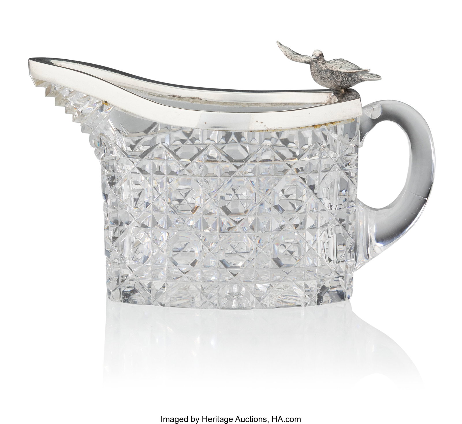 A Fabergé Silver-Mounted and Cut-Glass Cream Ju: A Fabergé Silver-Mounted and Cut-Glass Cream Jug Fabergé with Imperial Warrant, Moscow, before 1899 3-1/4 x 5-1/2 x 2-1/2 inches (8.3 x 14.0 x 