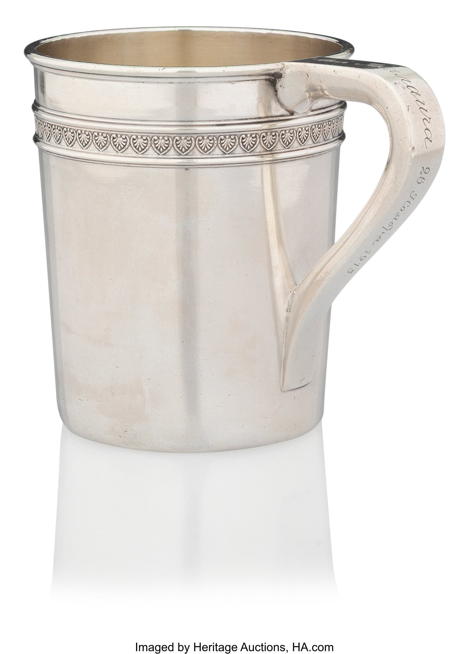 A Fabergé Silver Cup with Handle Fabergé with : A Fabergé Silver Cup with Handle Fabergé with Imperial Warrant, Moscow, 1908-1917 3-1/4 x 4 x 2-3/4 inches (8.3 x 10.2 x 7.0 cm) 196 gr
