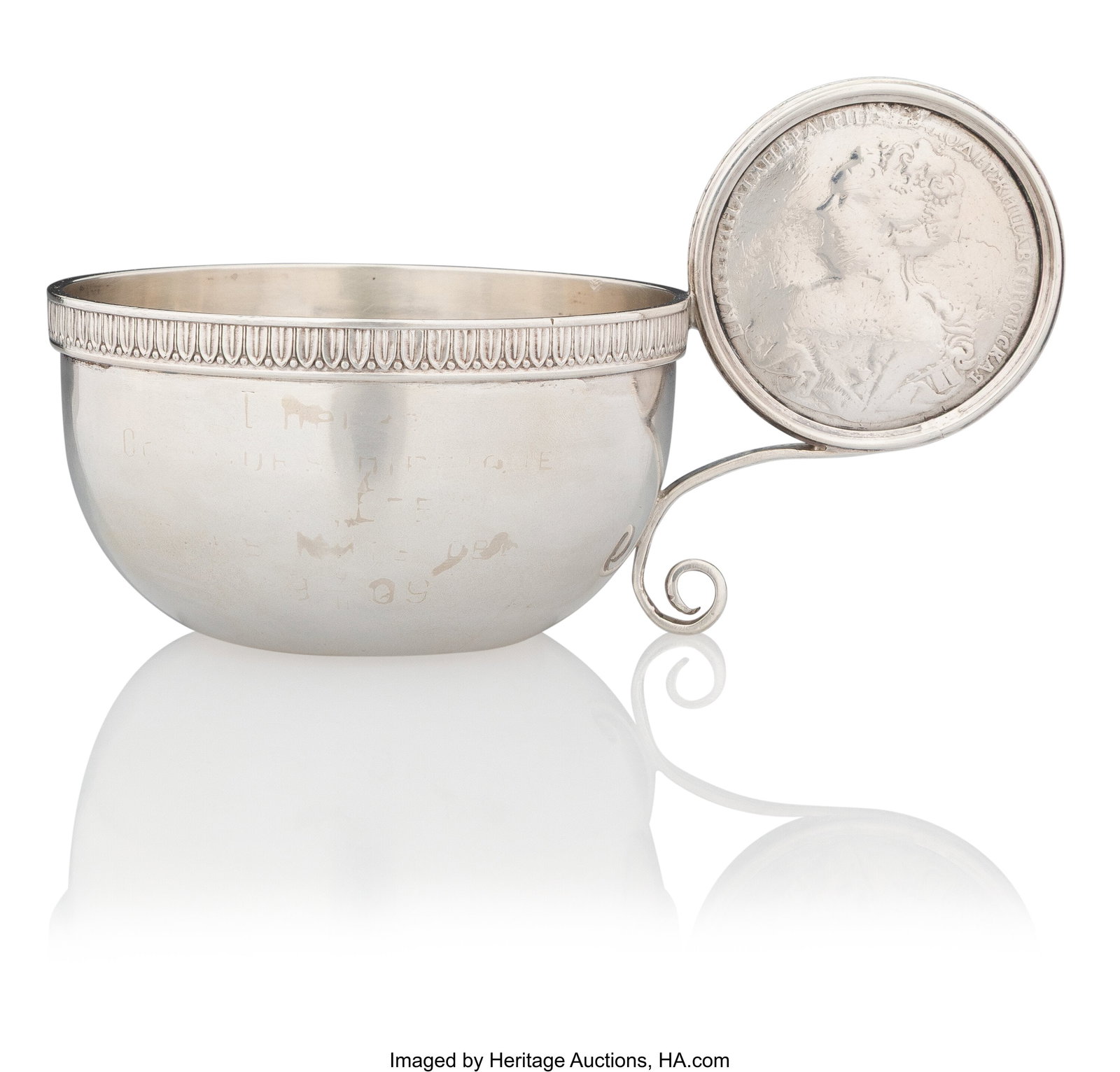 A Russian Coin-Set Silver Charka Maker's mark in: A Russian Coin-Set Silver Charka Maker's mark indistinct, possibly Abraham Beilin-Levkov, St. Petersburg, 1904-1908 2-3/4 x 4-7/8 x 3-1/8 inches (7.0 x